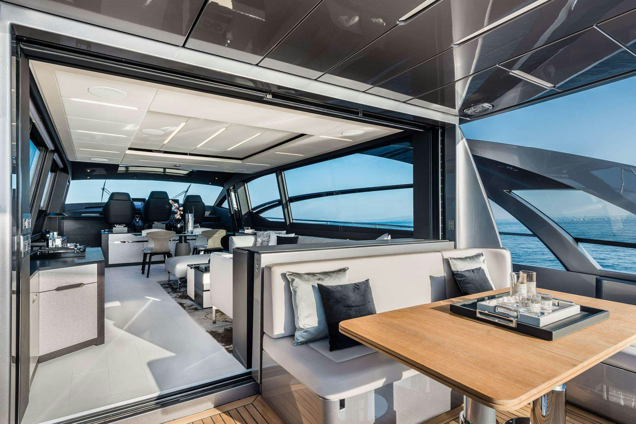 inside of a building with a table and chairs aboard CHERRY Yacht for Charter