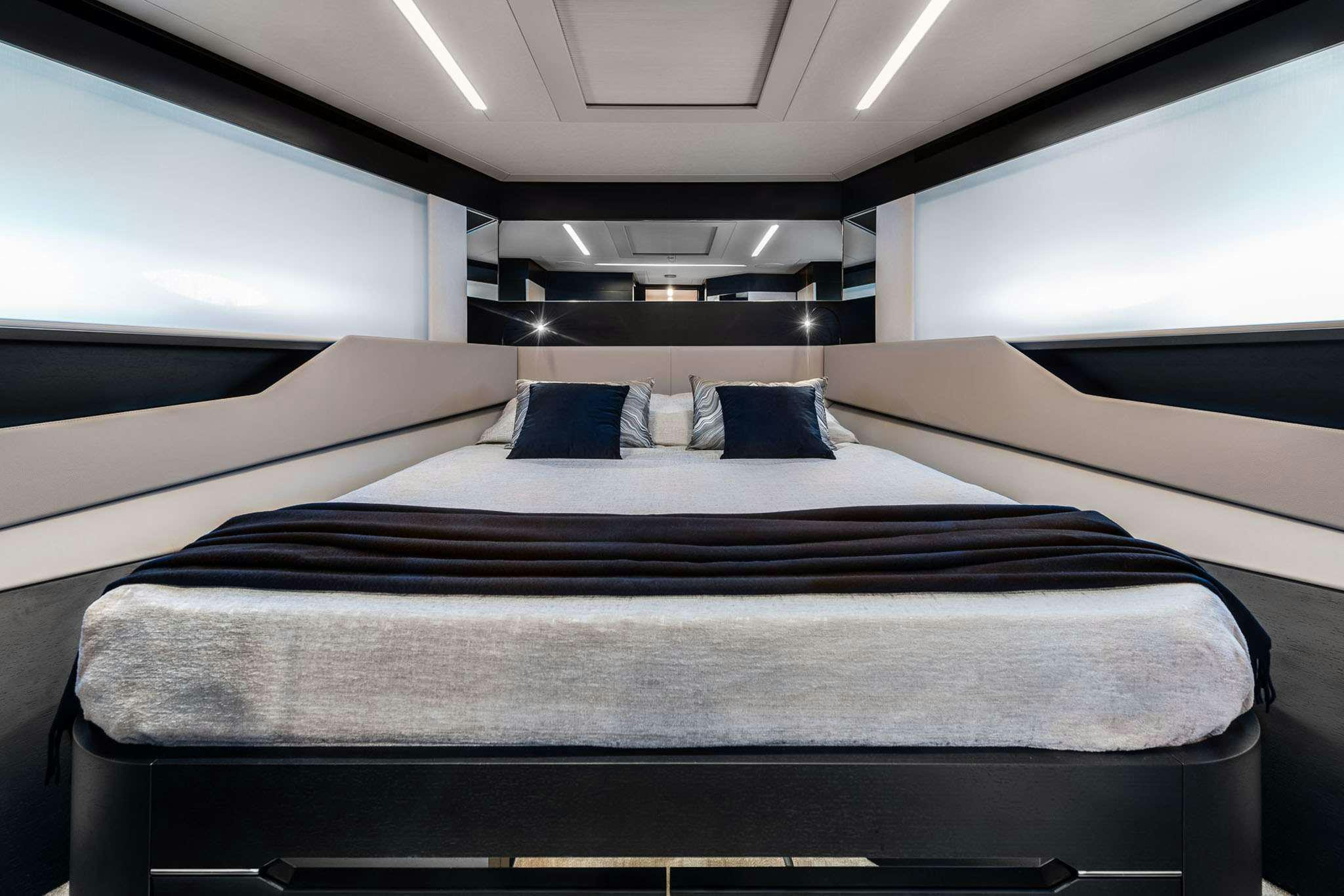 a bed in a room aboard CHERRY Yacht for Charter