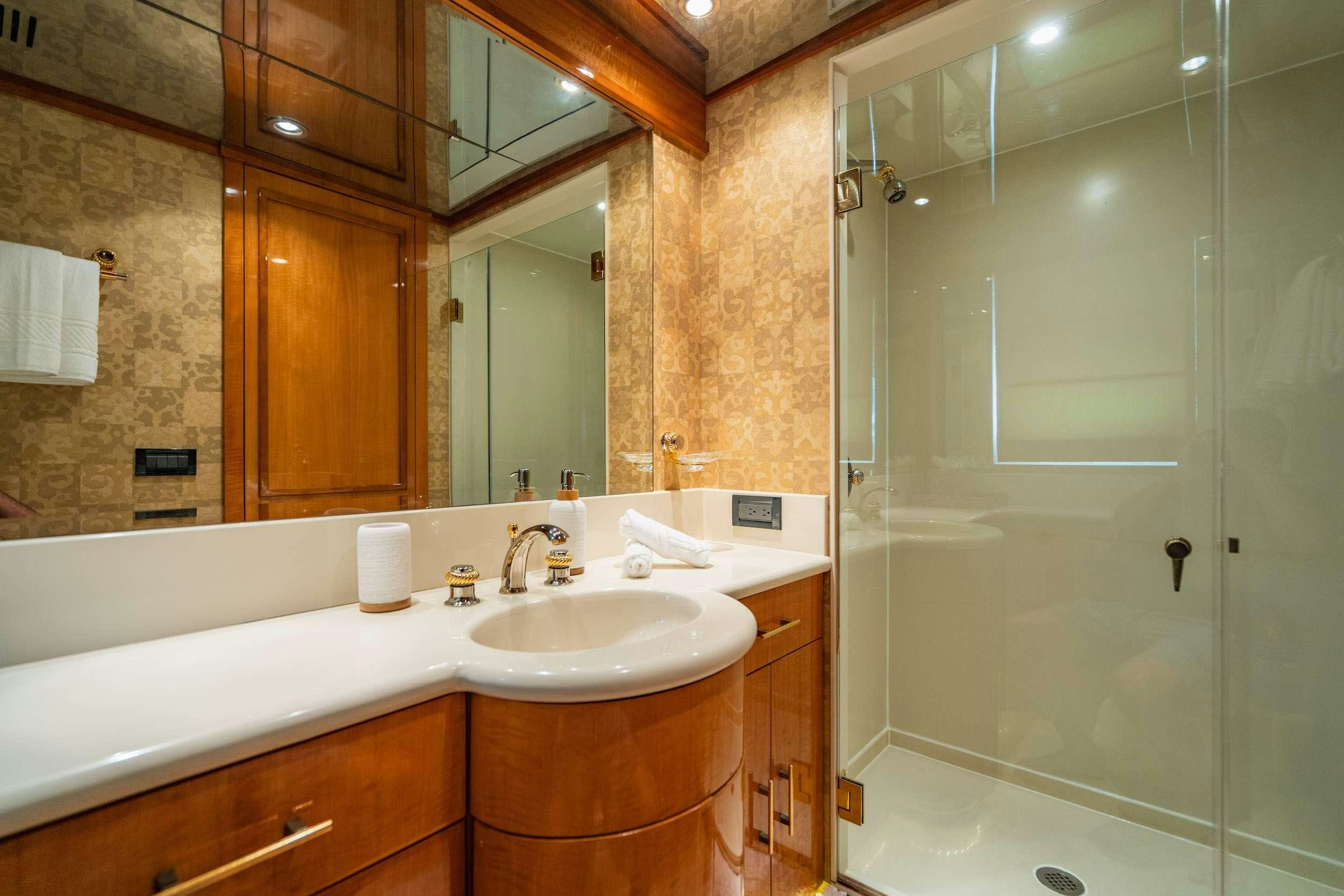 a bathroom with a large shower unit aboard CARPE DIEM Yacht for Charter