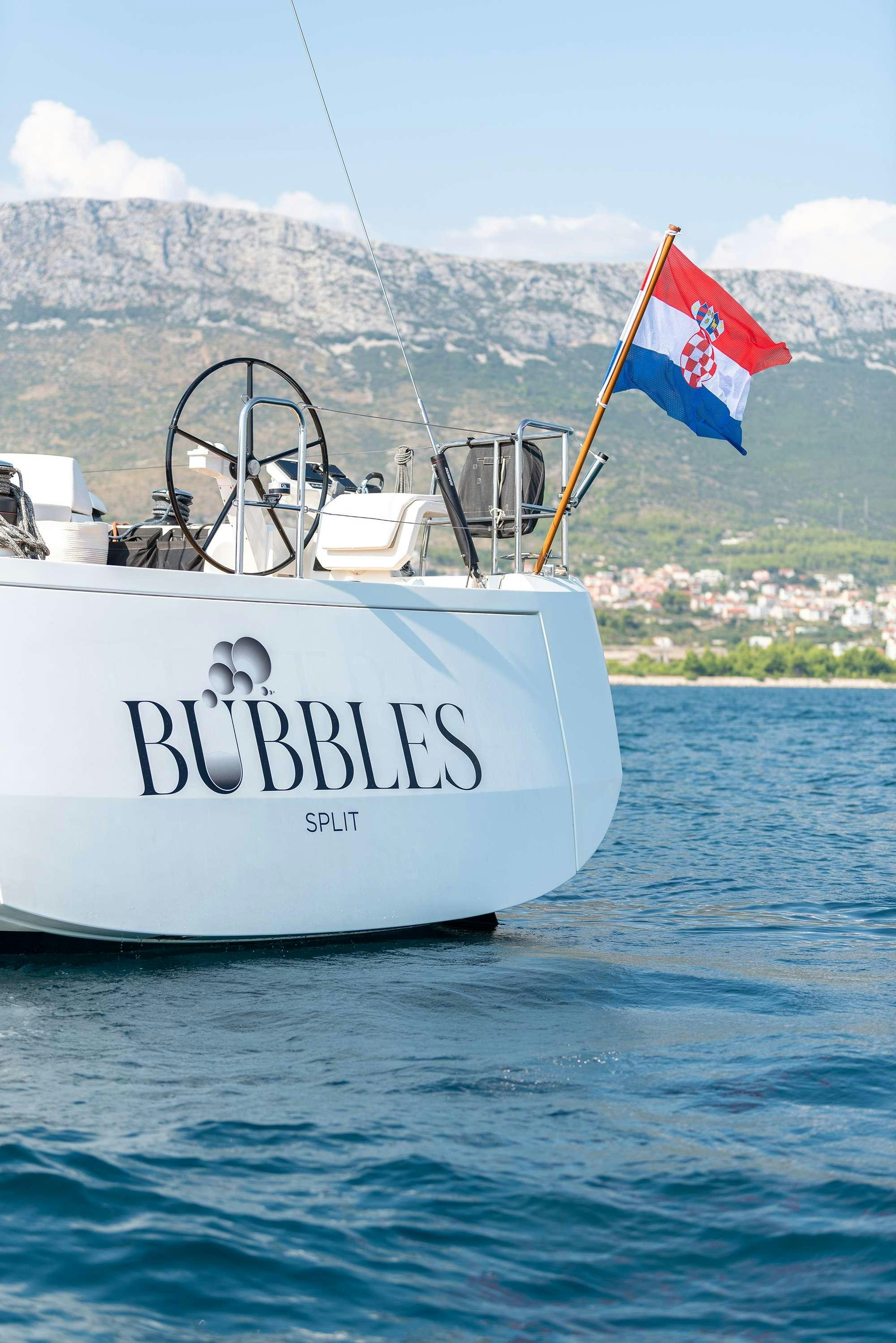 a boat on the water aboard BUBBLES Yacht for Charter
