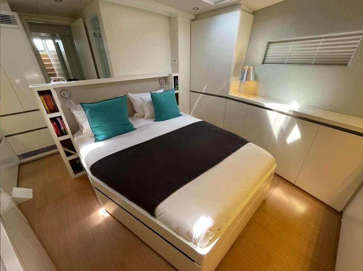 a bed in a room aboard BUBBLES Yacht for Charter