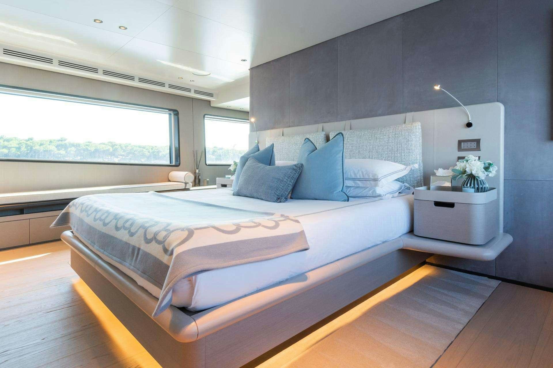 a bed in a room aboard MRS L Yacht for Charter