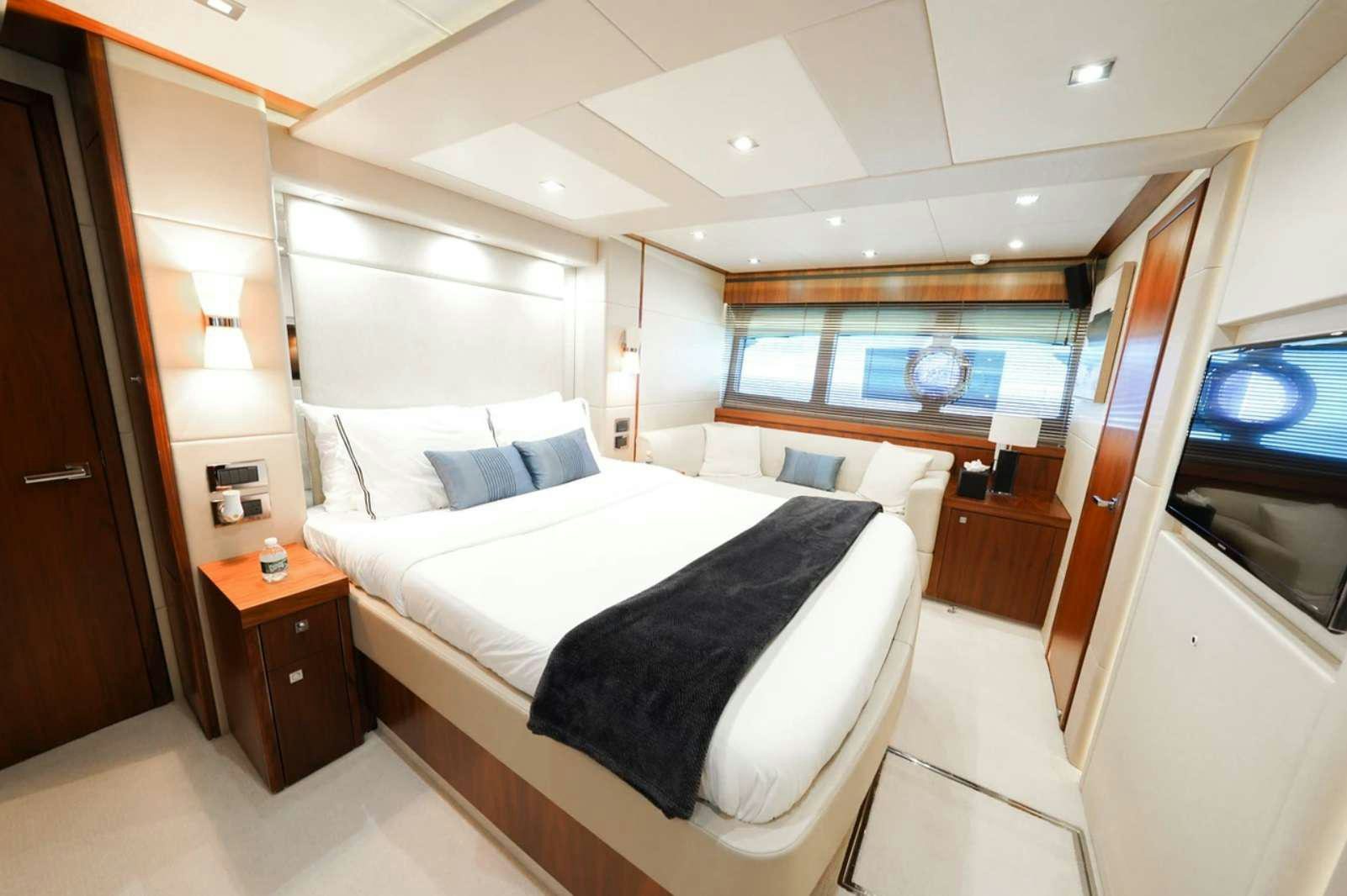 a bed in a room aboard CATCH THE WAVE Yacht for Charter