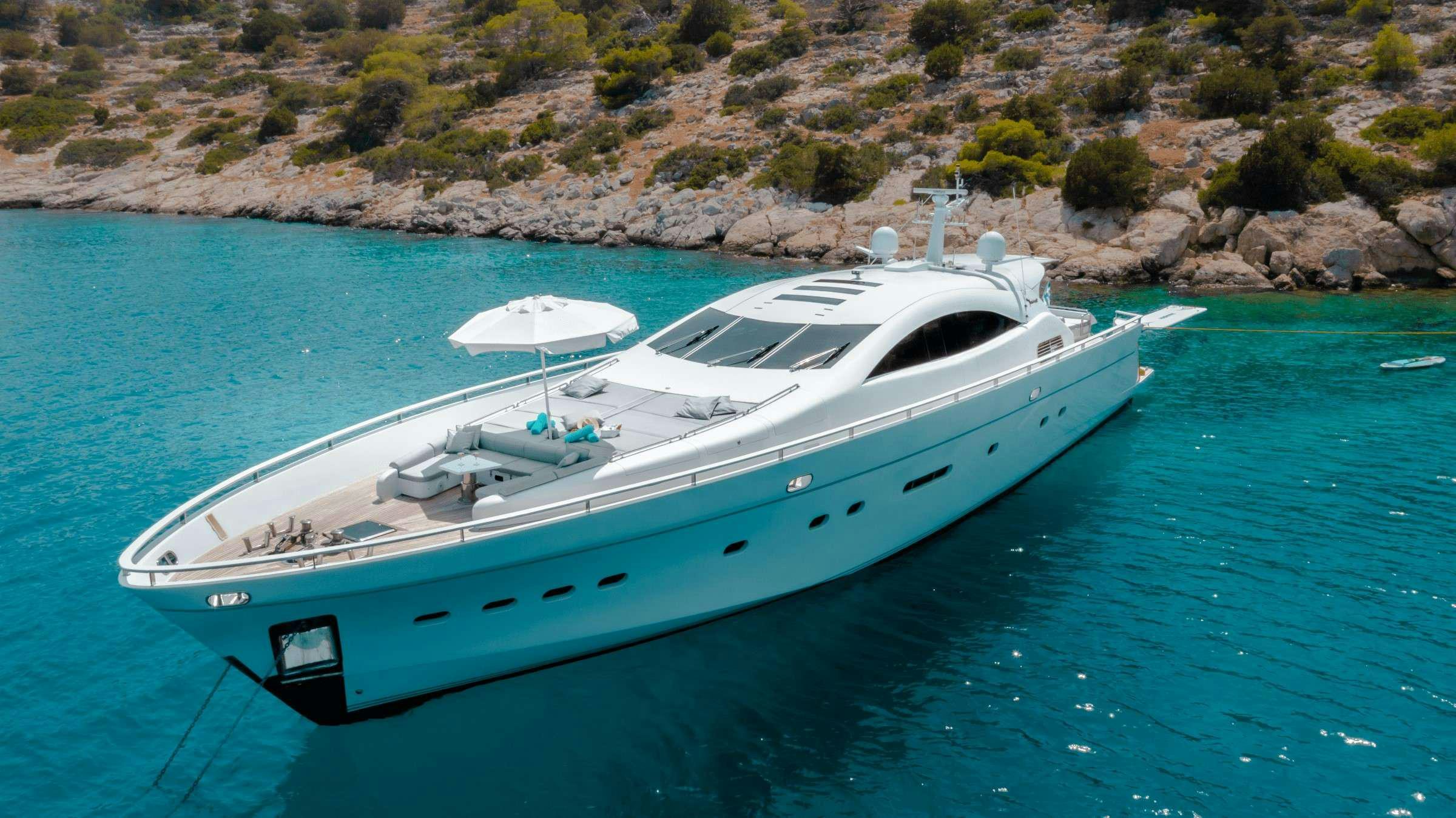 a white boat in the water aboard MAC Yacht for Charter