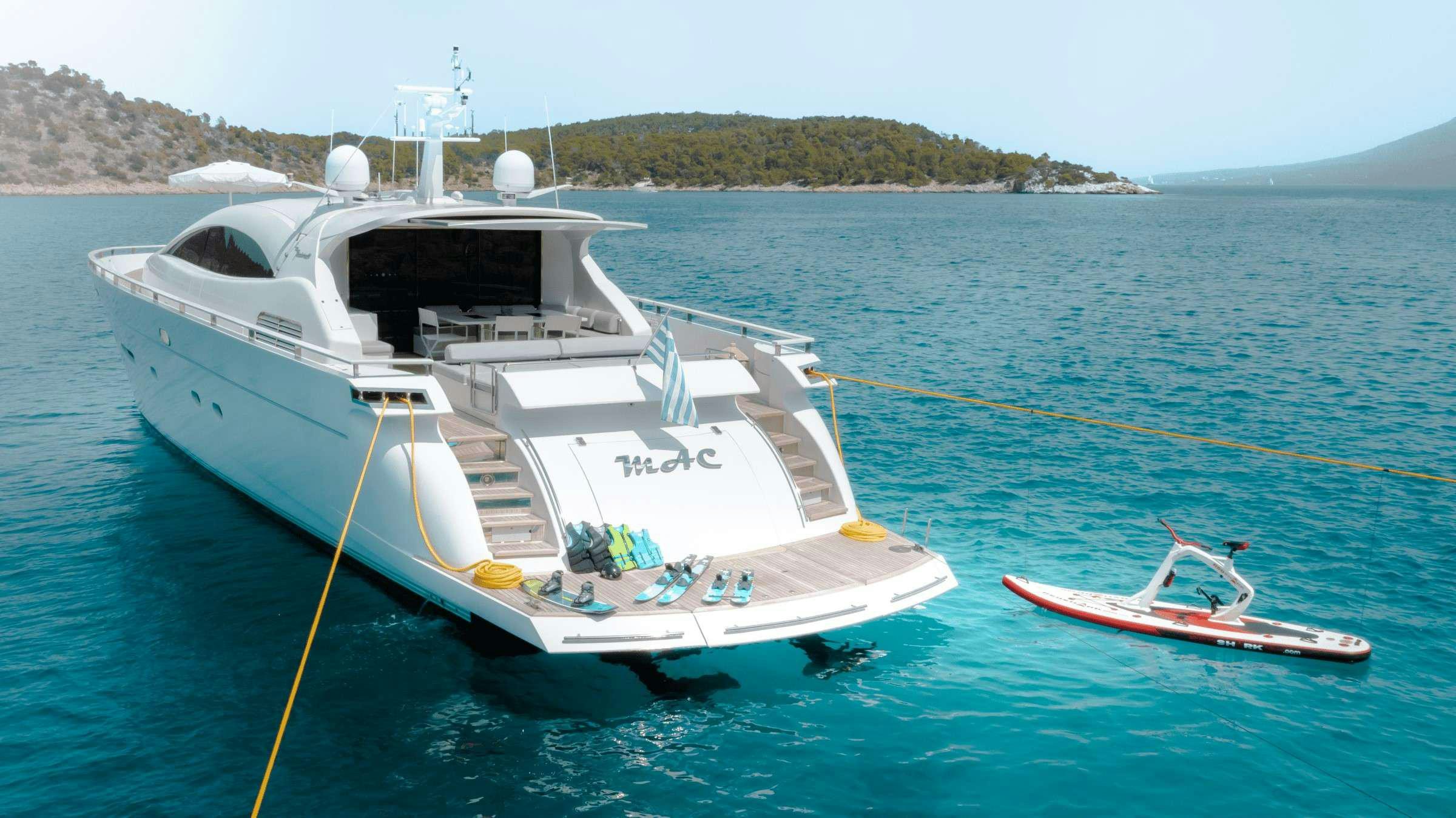 a boat tied to a dock aboard MAC Yacht for Charter