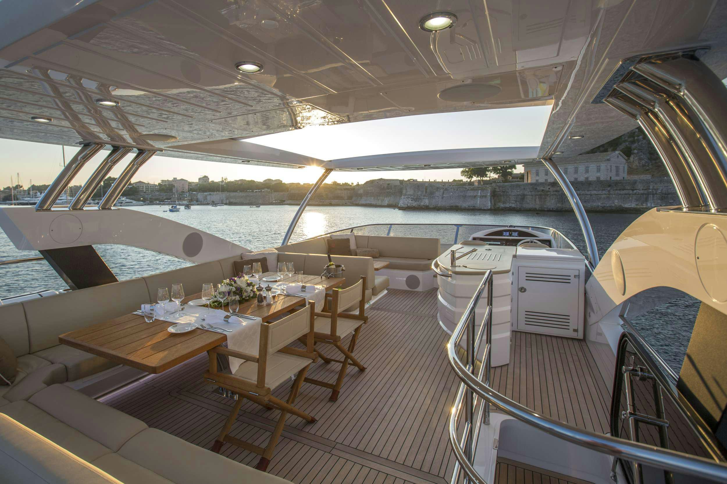 a boat with tables and chairs aboard FINEZZA Yacht for Charter