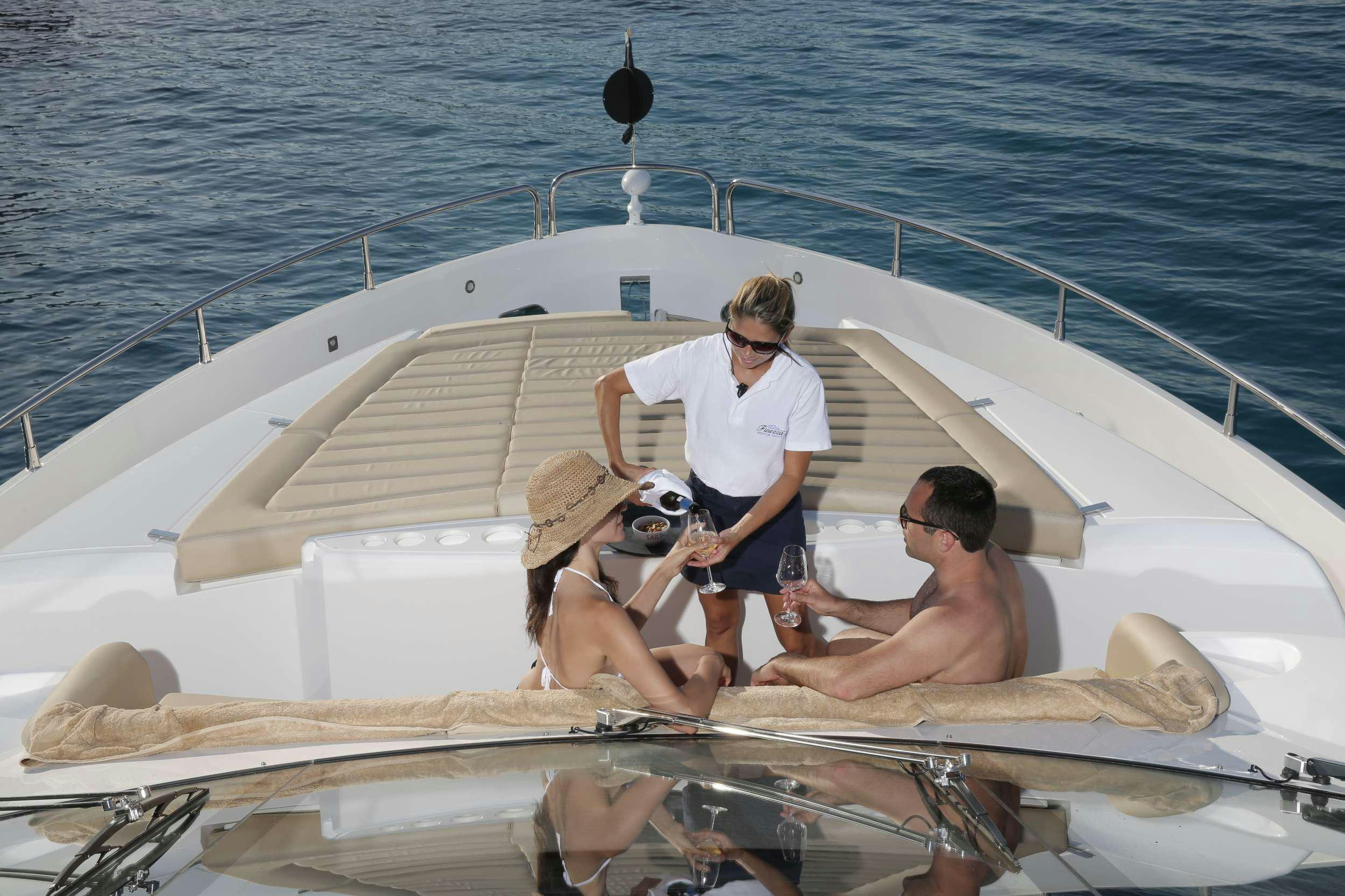 a group of people on a boat aboard FINEZZA Yacht for Charter