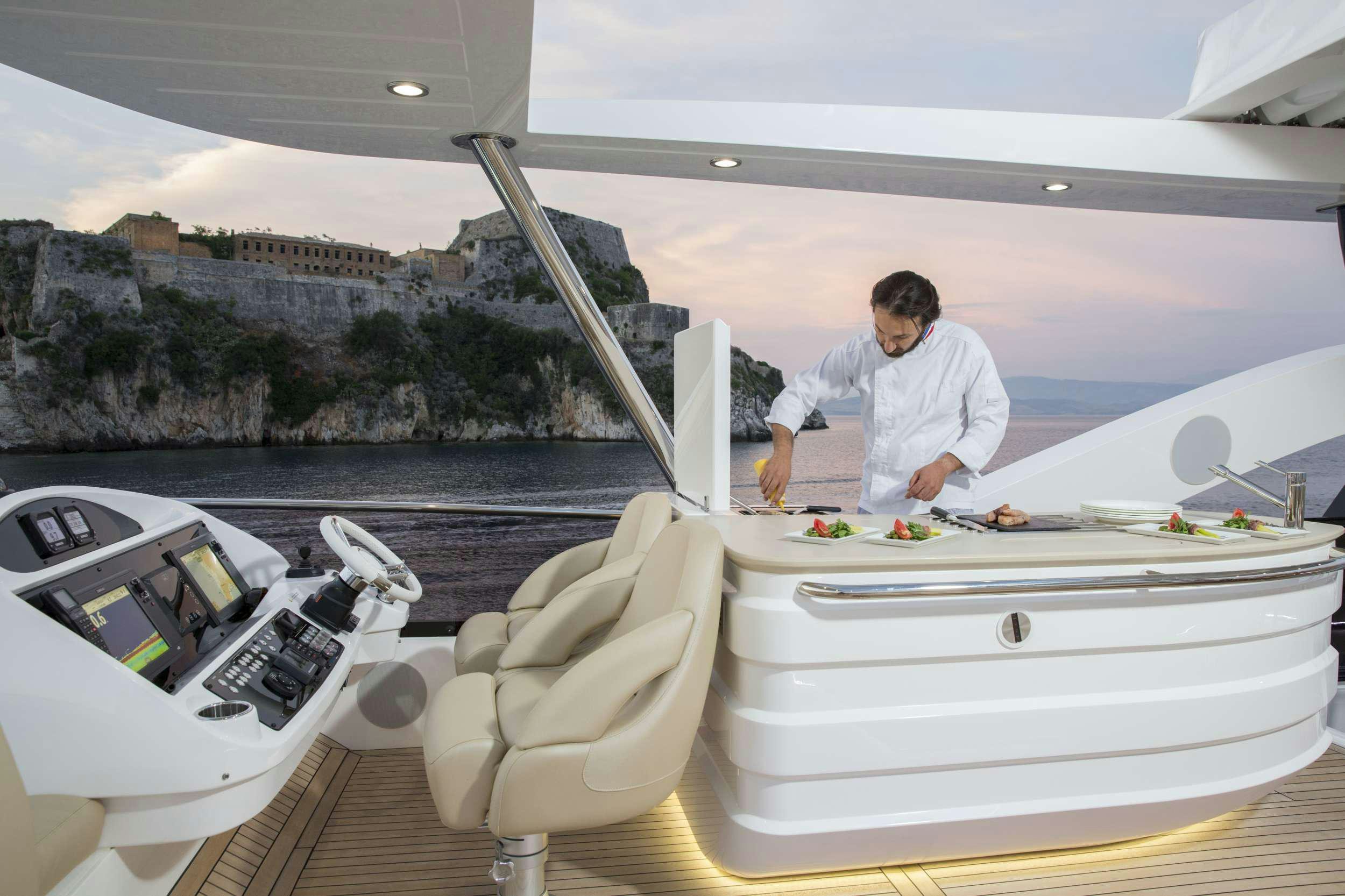 a person sitting on a boat aboard FINEZZA Yacht for Charter
