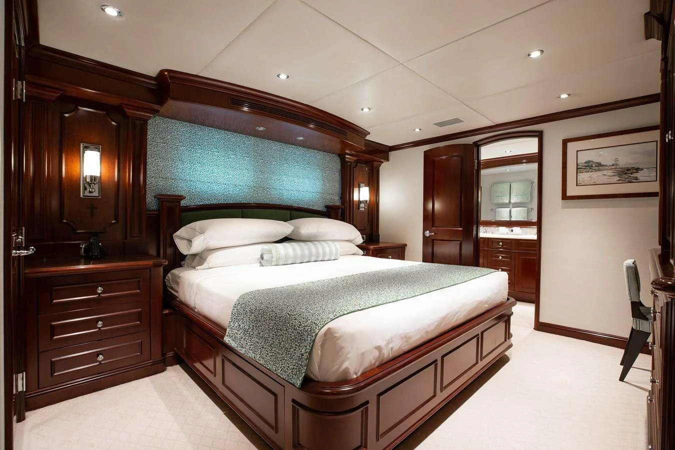 a large bedroom with a bed aboard BOUCHON Yacht for Charter