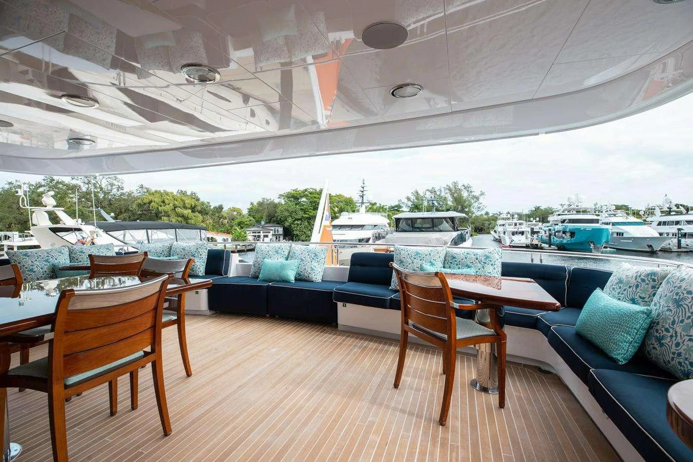 a room with a table and chairs aboard BOUCHON Yacht for Charter