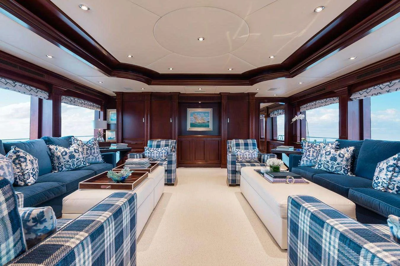 a living room with a large open window aboard BOUCHON Yacht for Charter