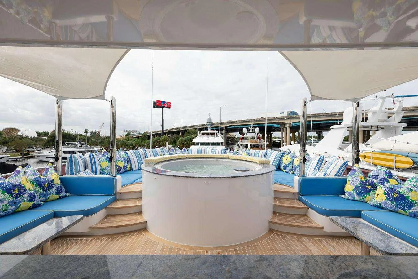 a white bucket on a wooden deck aboard BOUCHON Yacht for Charter