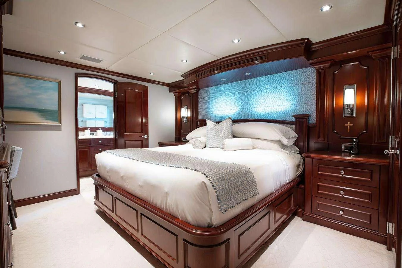 a large bedroom with a large bed aboard BOUCHON Yacht for Charter