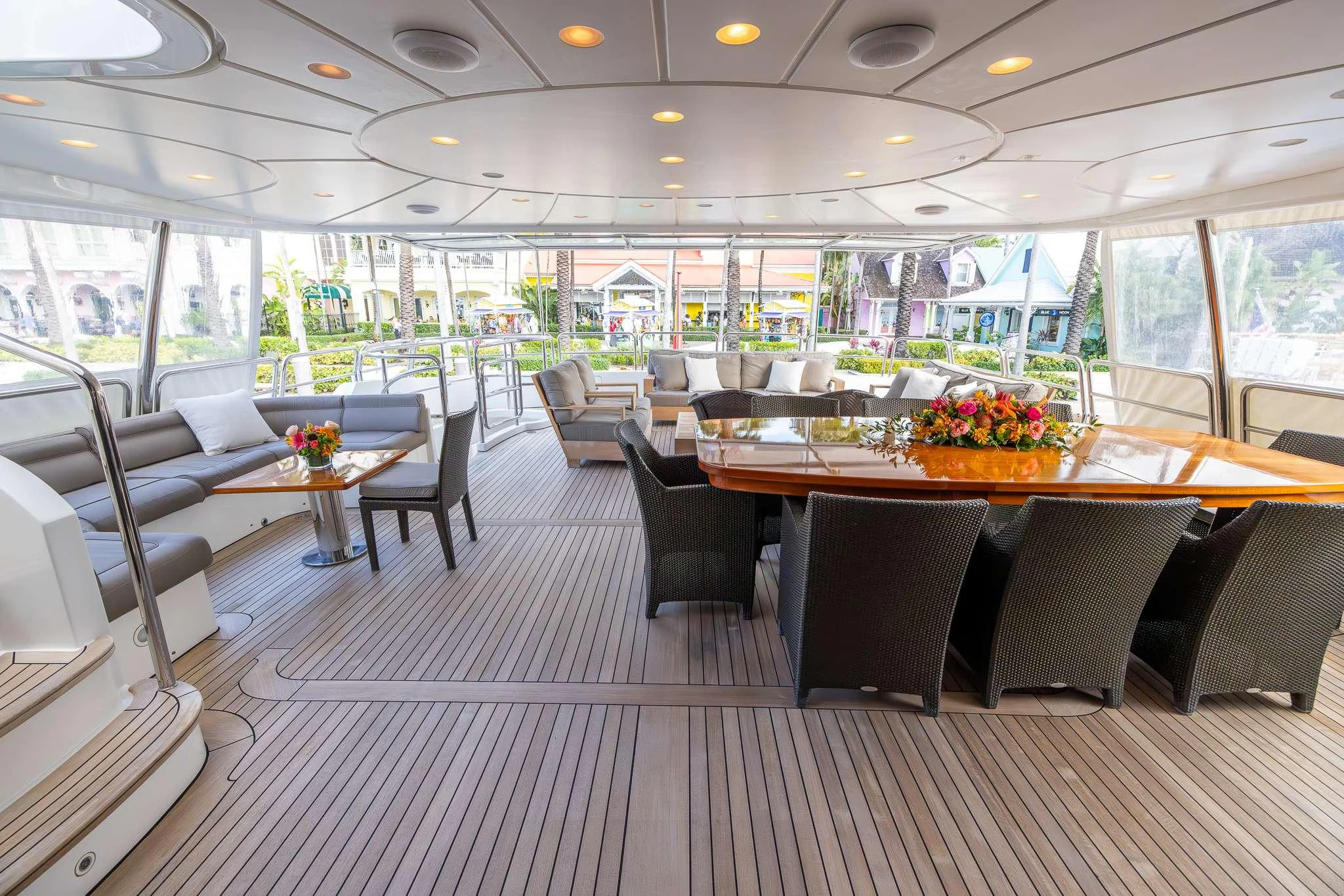 a room with tables and chairs aboard ARTHUR'S WAY Yacht for Charter