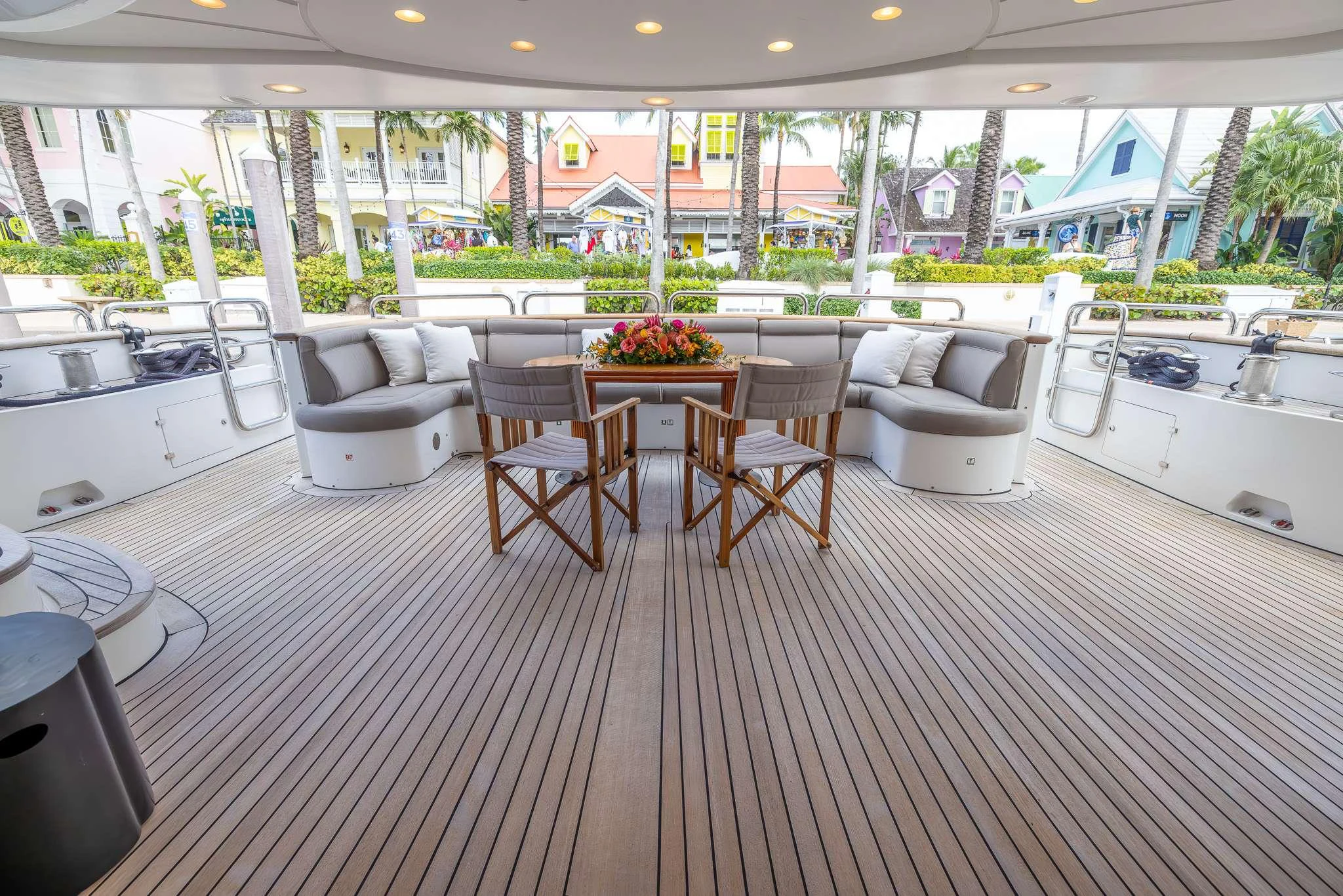 a large room with a table and chairs aboard ARTHUR'S WAY Yacht for Charter