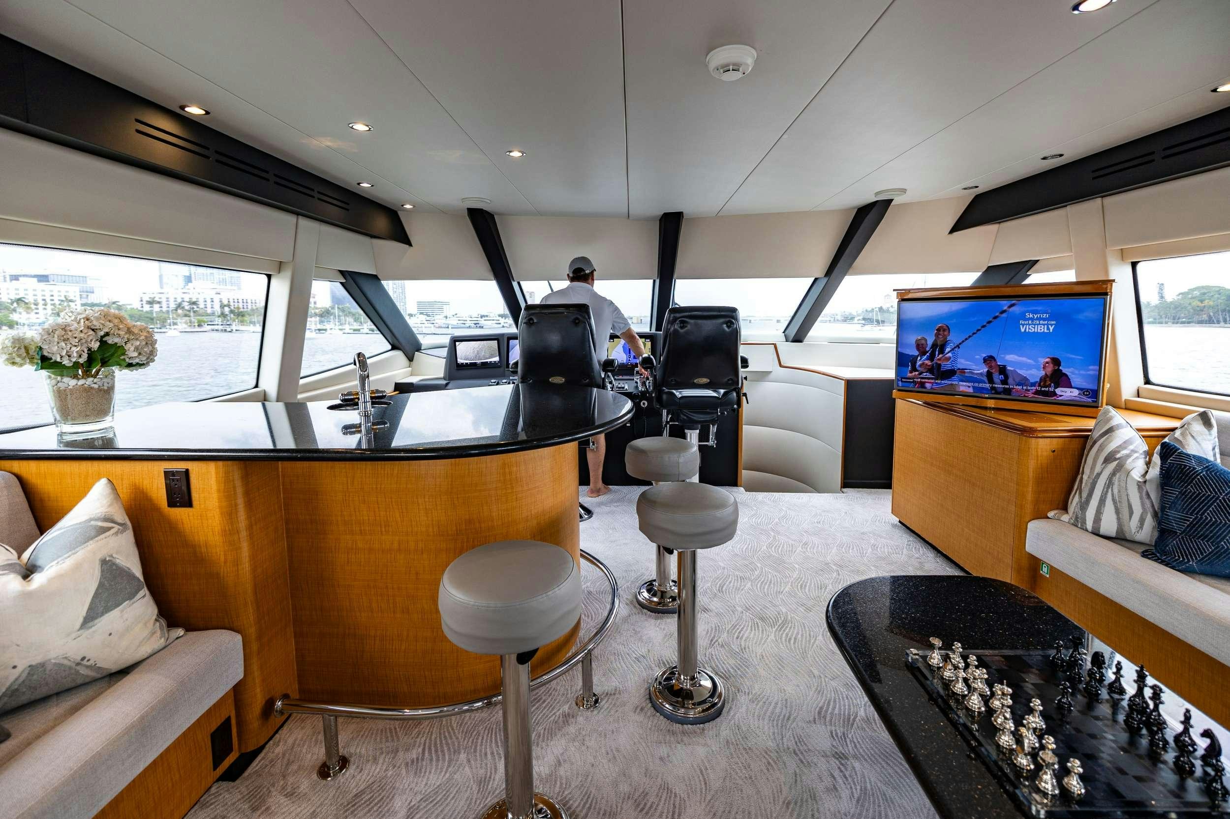 a person working in a room aboard INDY Yacht for Charter