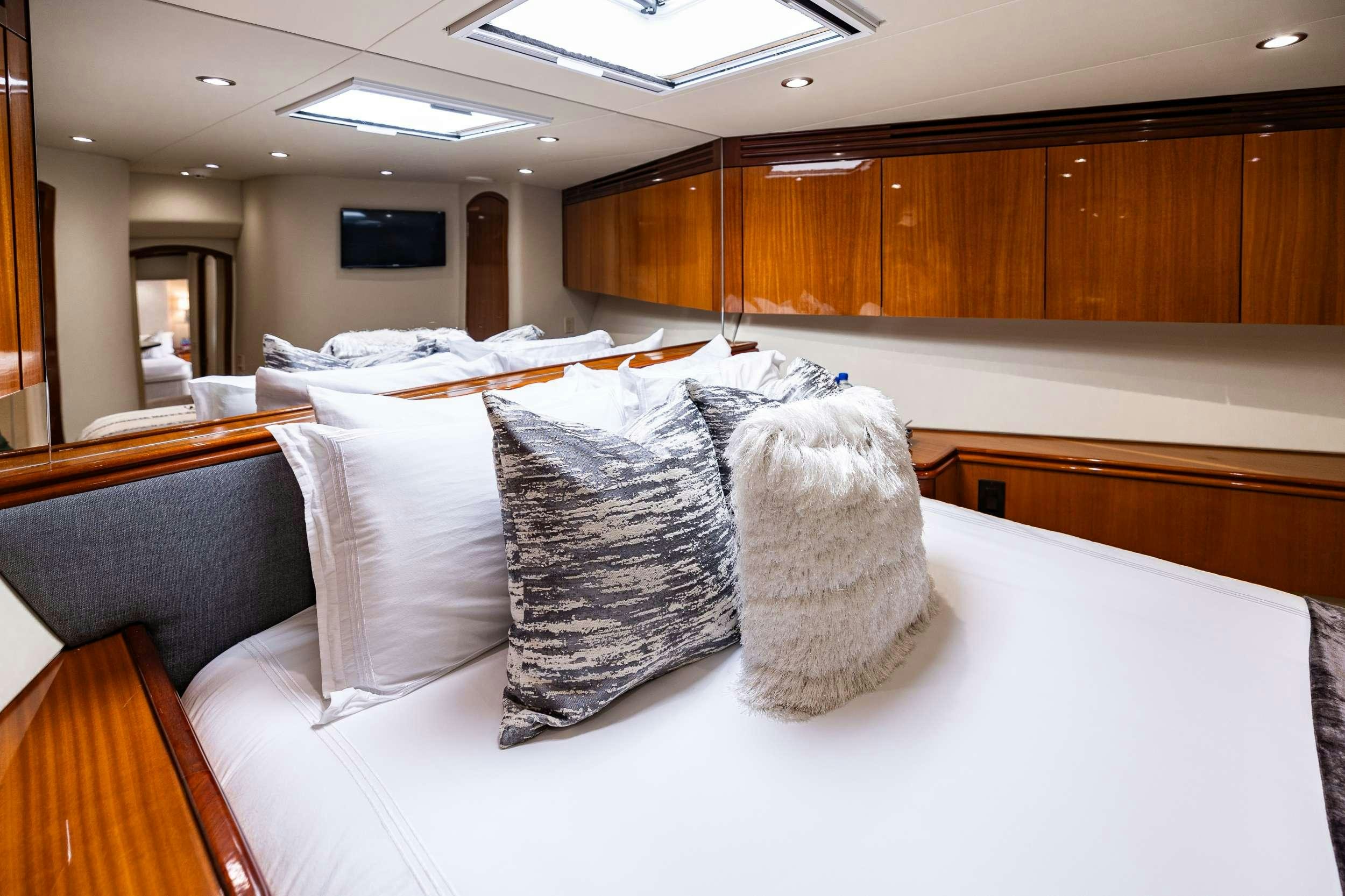pillows on a bed aboard INDY Yacht for Charter