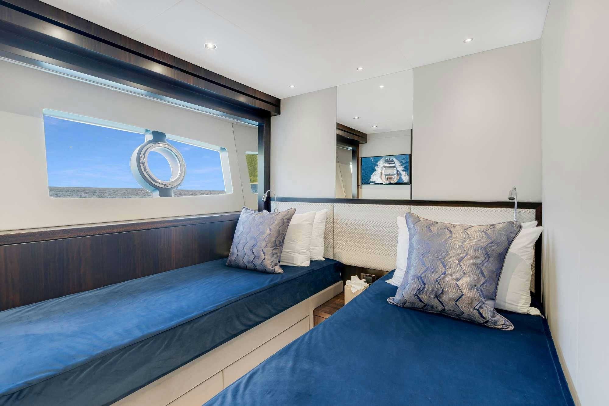 a room with two beds aboard ACCIDENTAL SUCCESS II Yacht for Charter