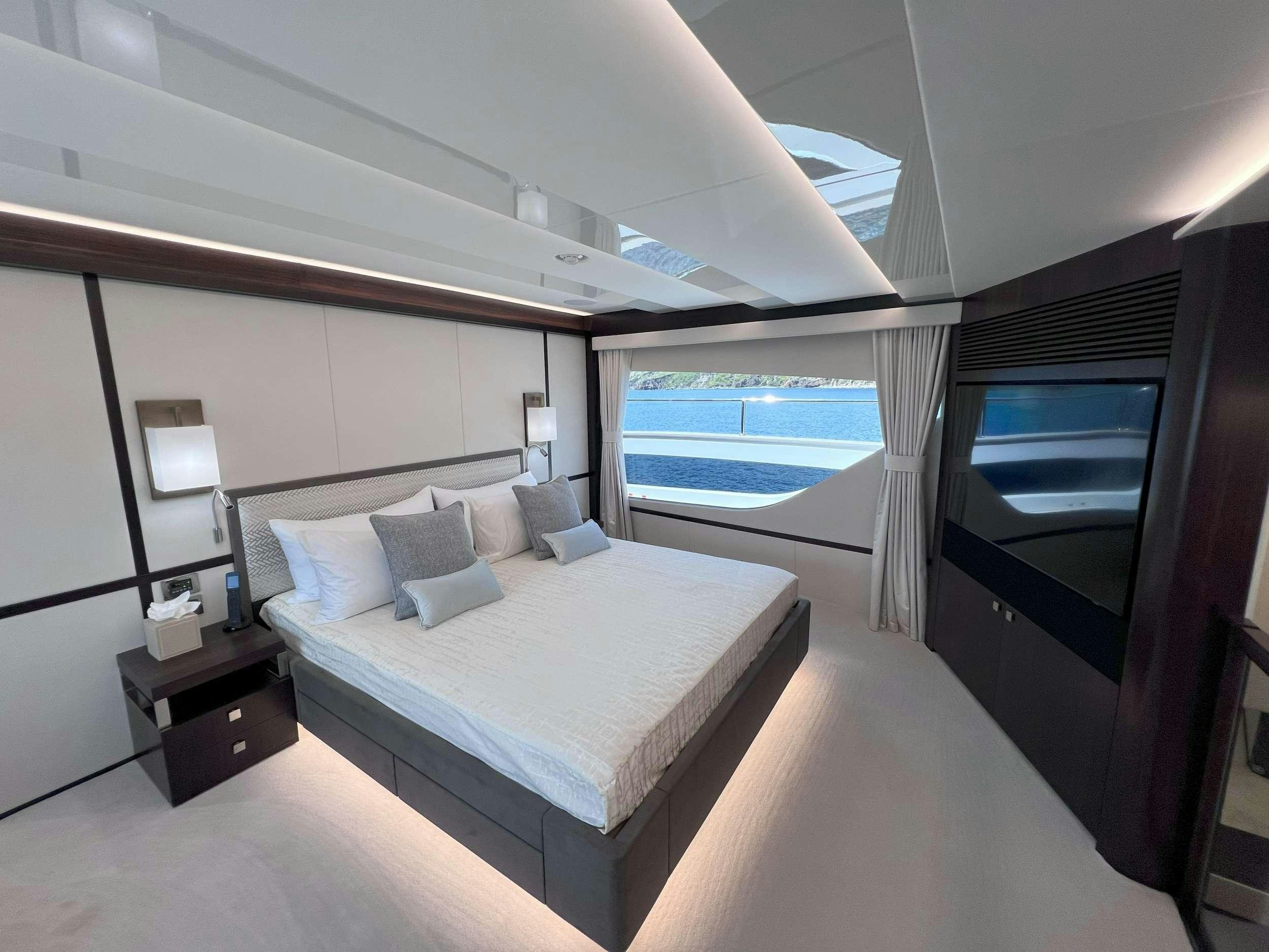 a bed in a room aboard ACCIDENTAL SUCCESS II Yacht for Charter
