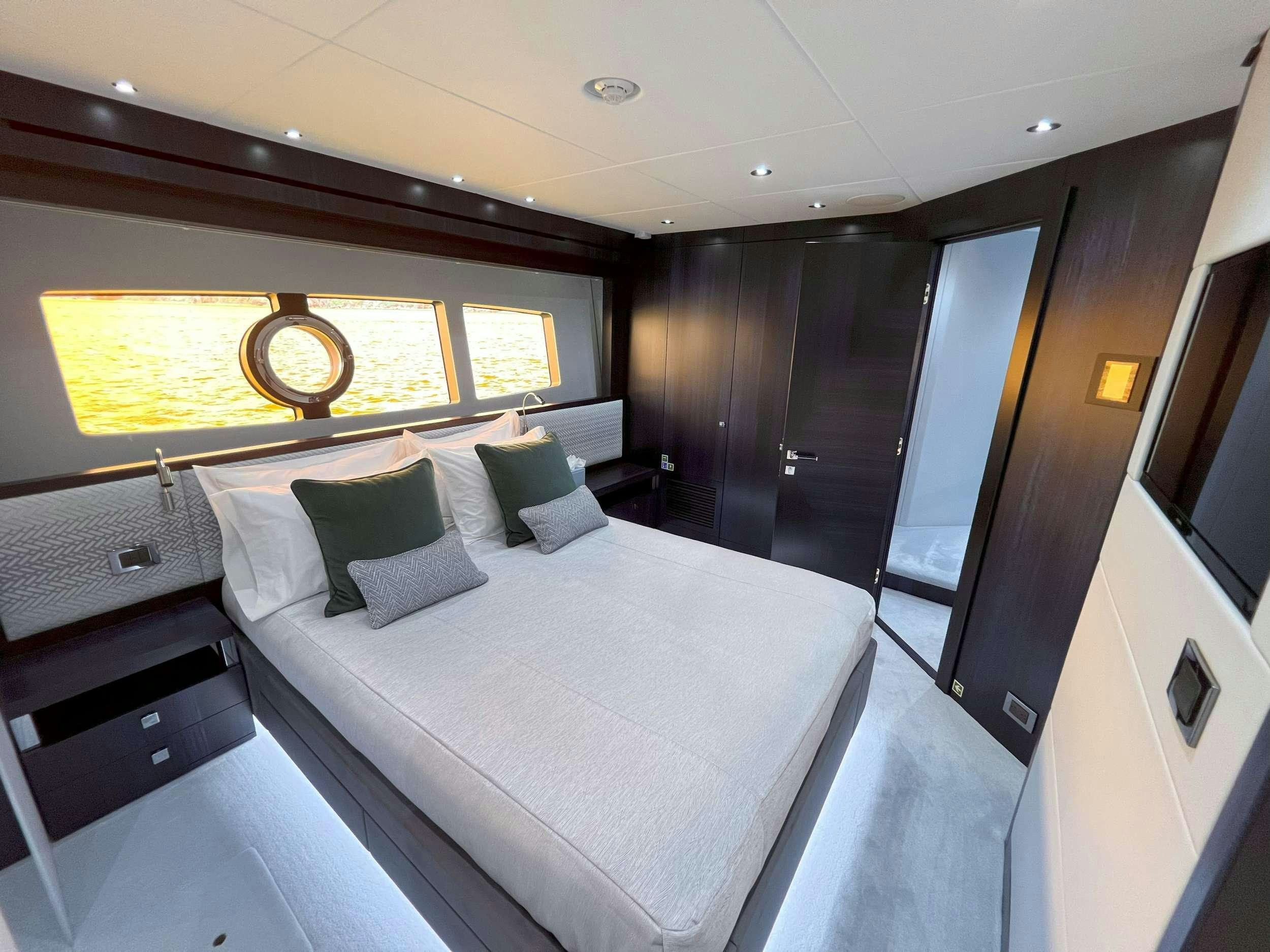a bed in a room aboard ACCIDENTAL SUCCESS II Yacht for Charter