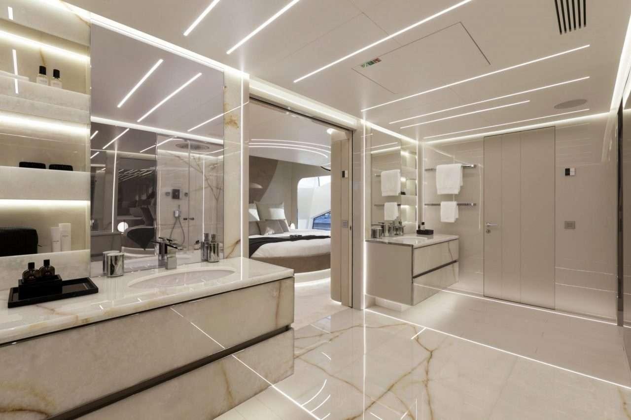 a bathroom with a large mirror aboard N1 Yacht for Charter