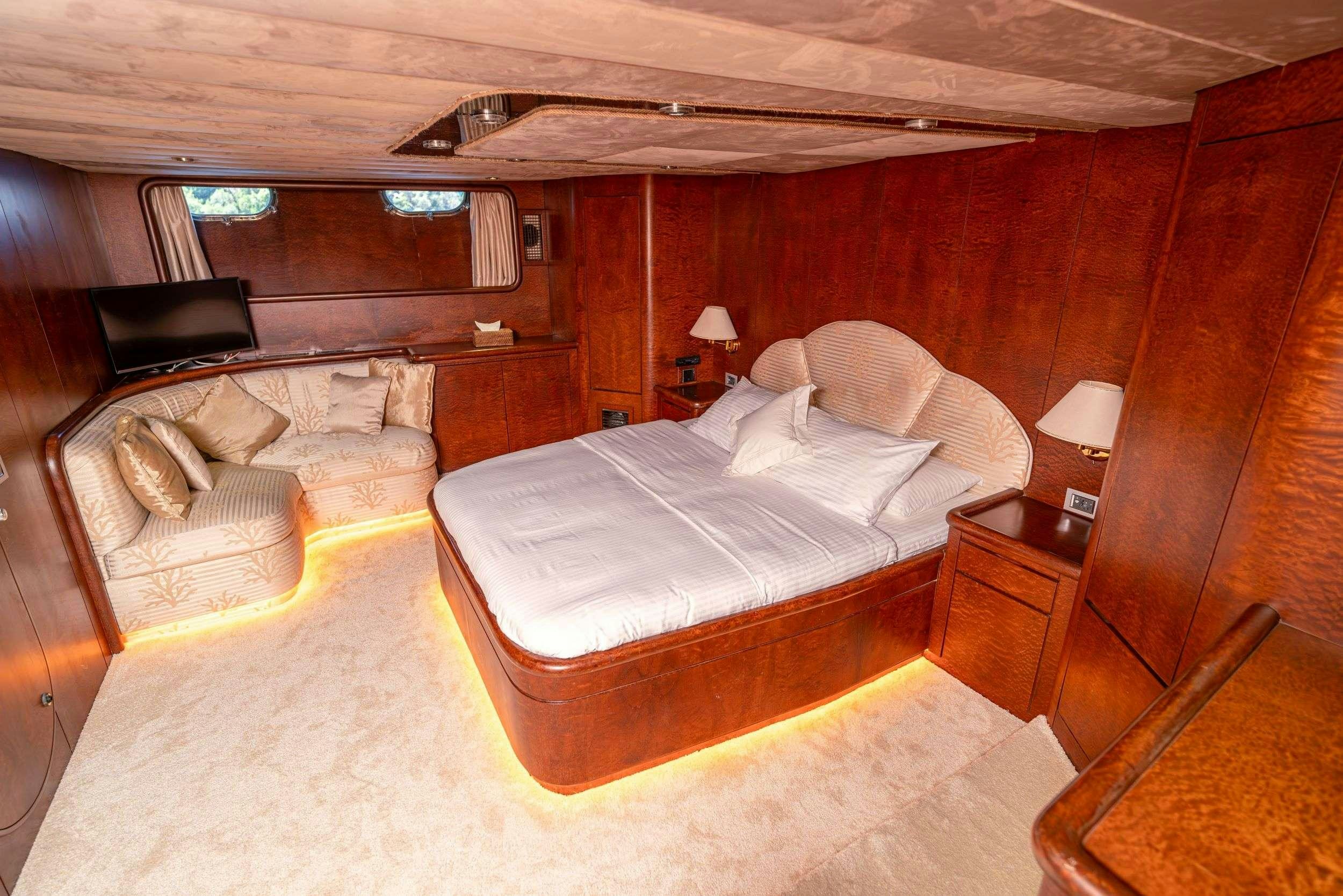 a bed in a room aboard BLUES Yacht for Charter