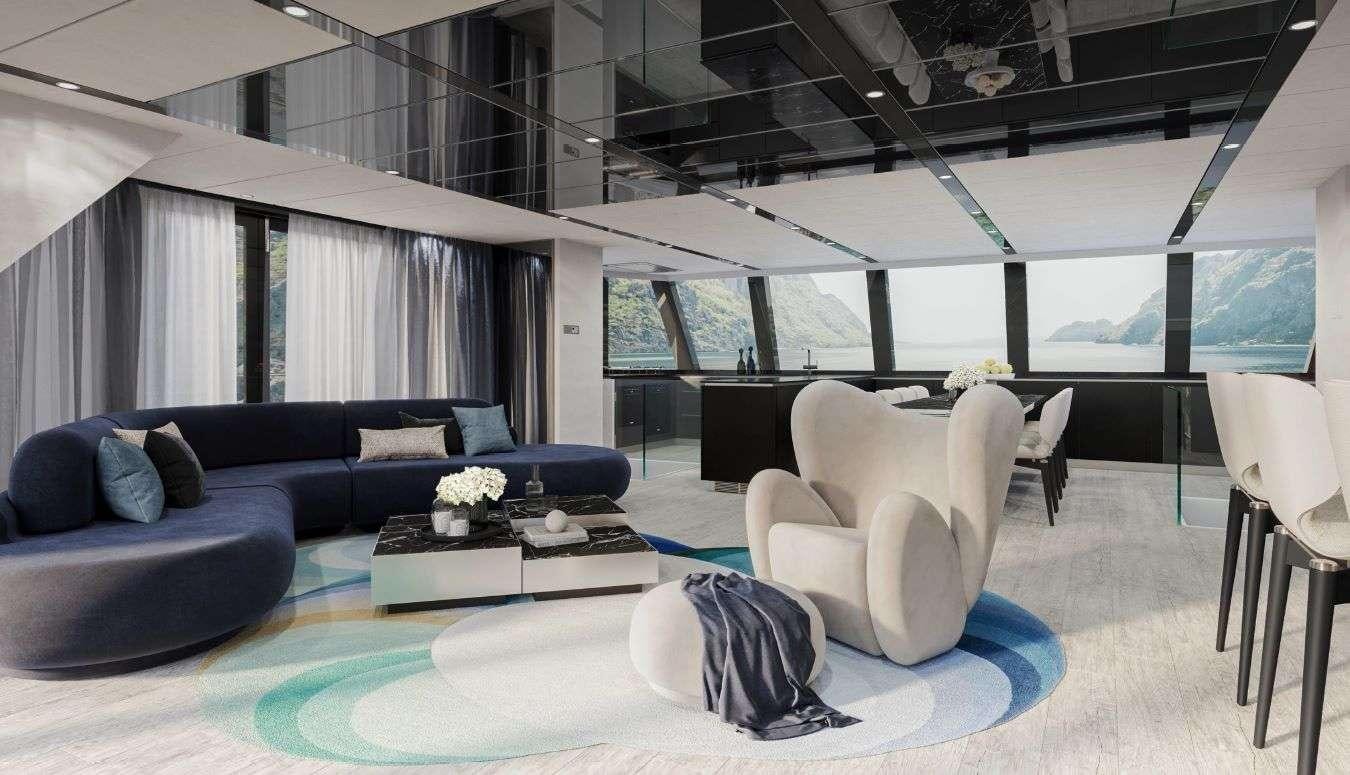 a modern living room with a blue couch and a large window aboard MARIA THERESE Yacht for Charter