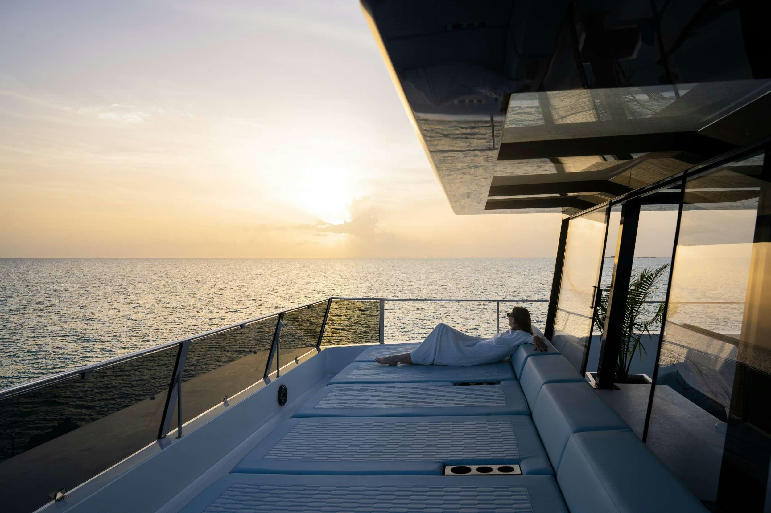 a person lying on a boat aboard MARIA THERESE Yacht for Charter