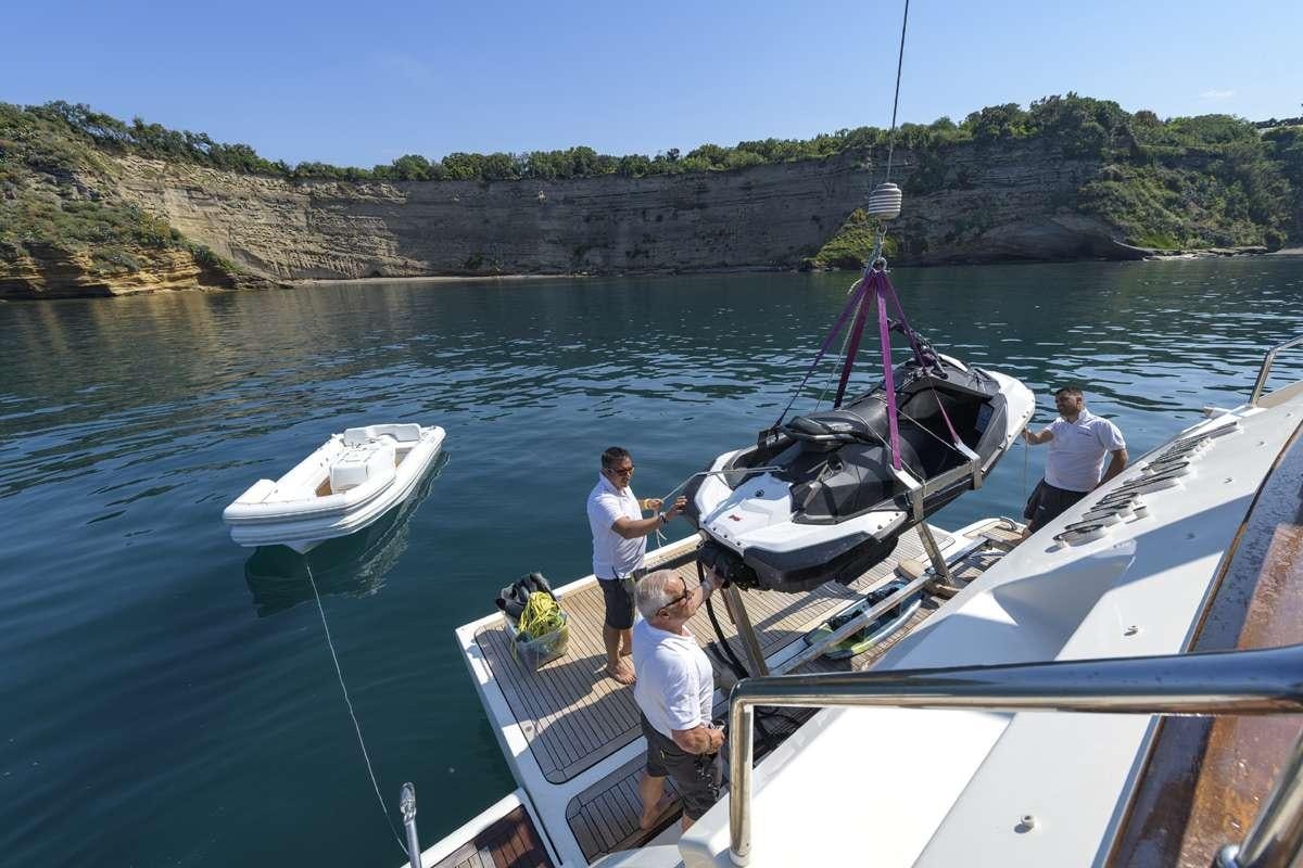 a group of people on a boat aboard ANNE MARIE Yacht for Charter
