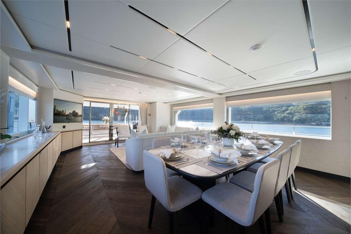 a large kitchen and dining area aboard BLUESTONE 1 Yacht for Charter