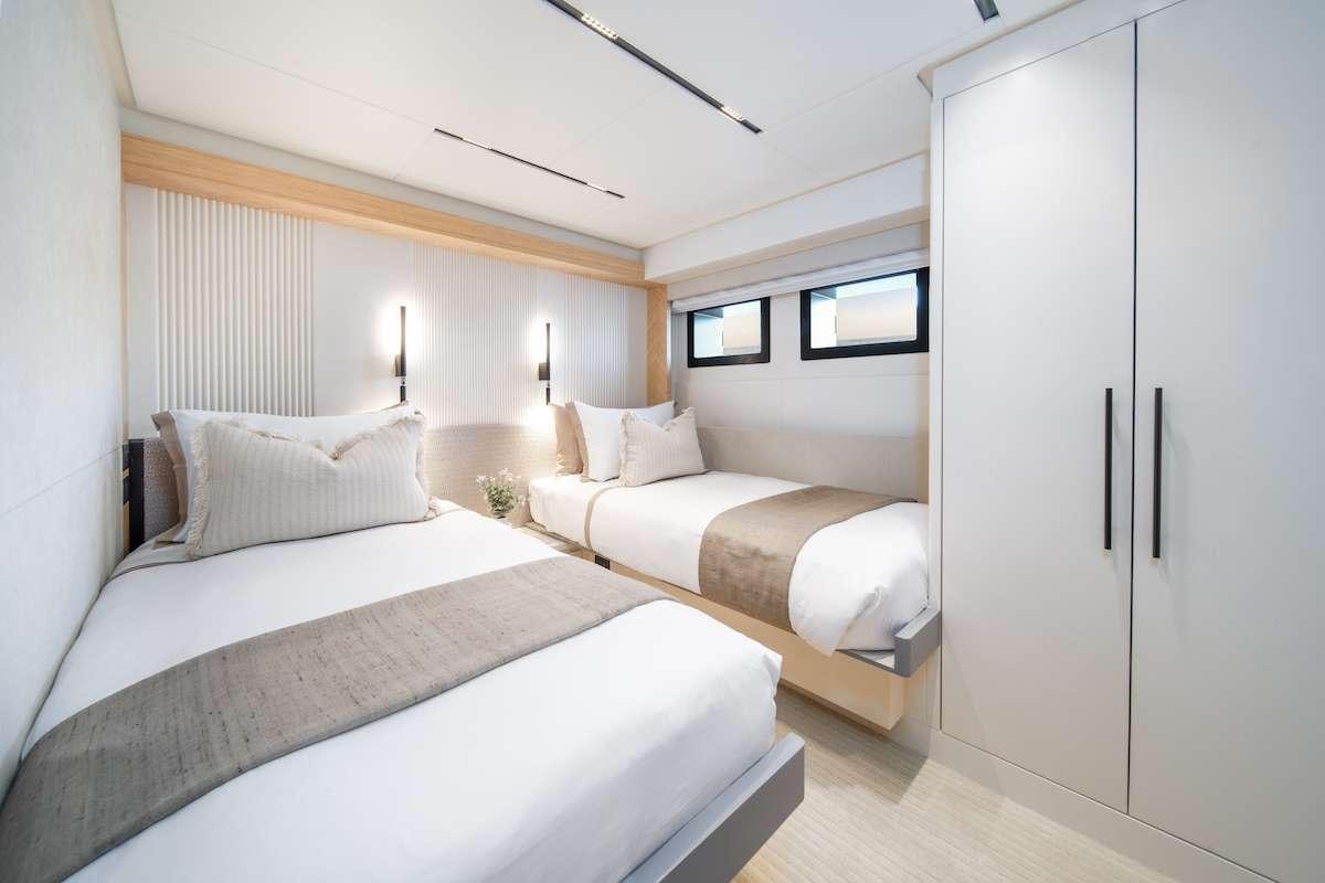 a room with two beds aboard BLUESTONE 1 Yacht for Charter