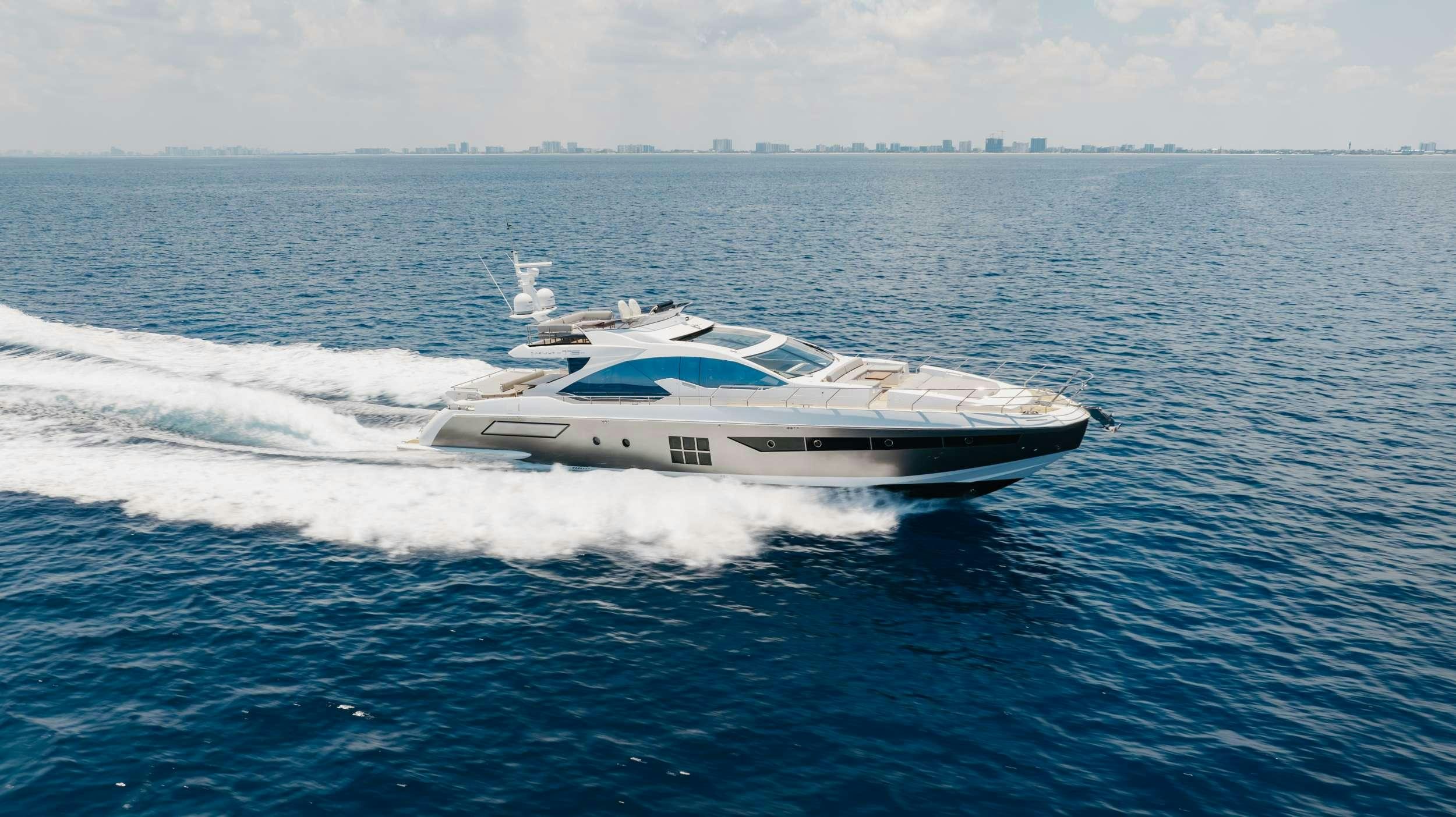 a boat on the water aboard HIGH MAINTENANCE Yacht for Charter