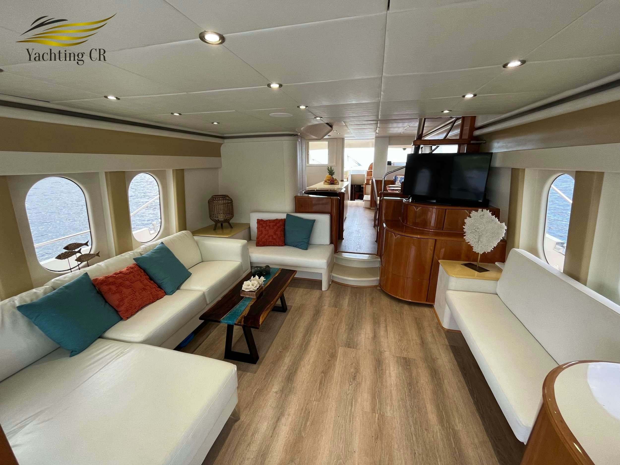 a living room with a wood floor aboard MORENA I Yacht for Charter