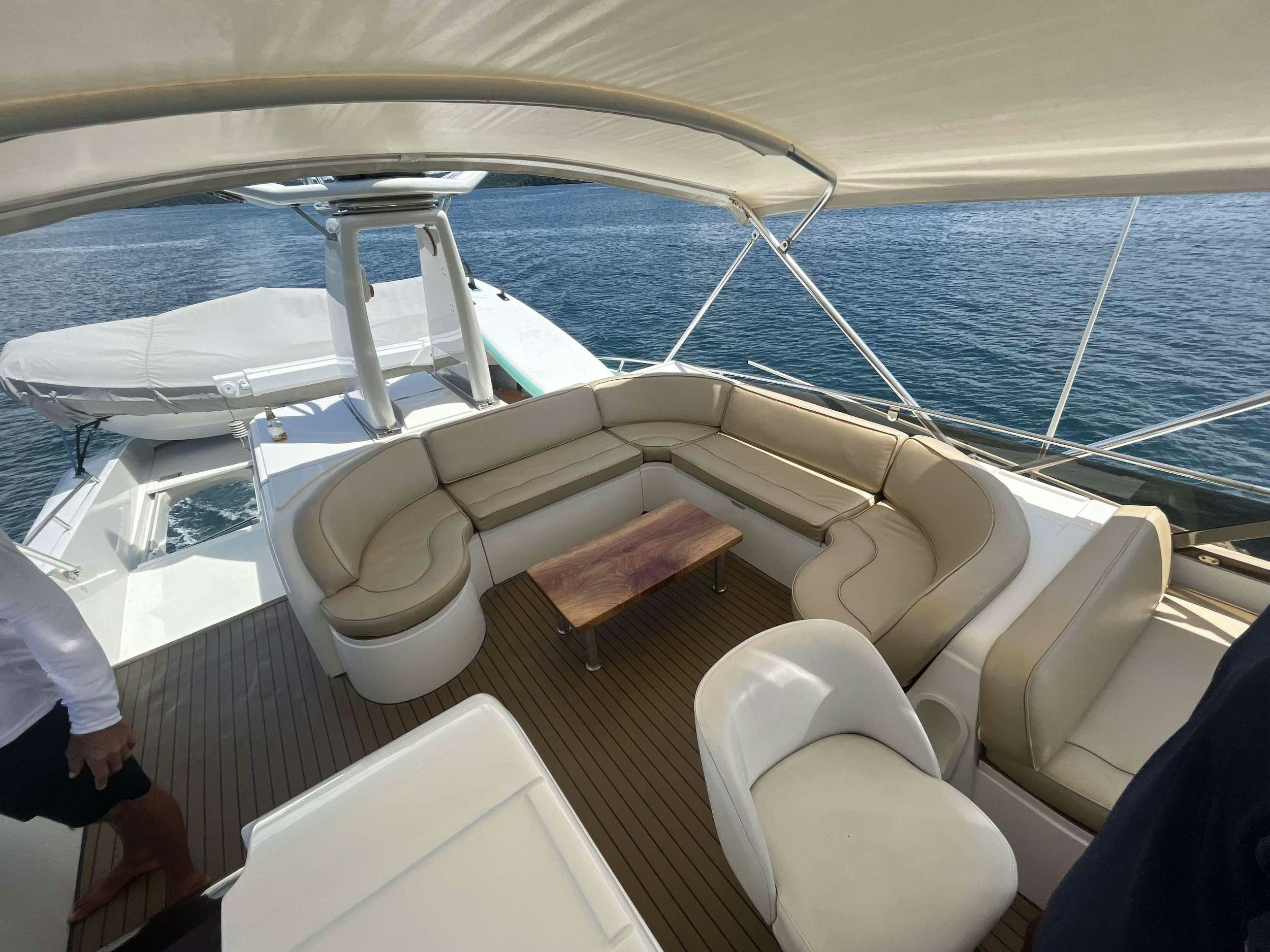a boat with a seat and a seat on the front aboard MORENA I Yacht for Charter