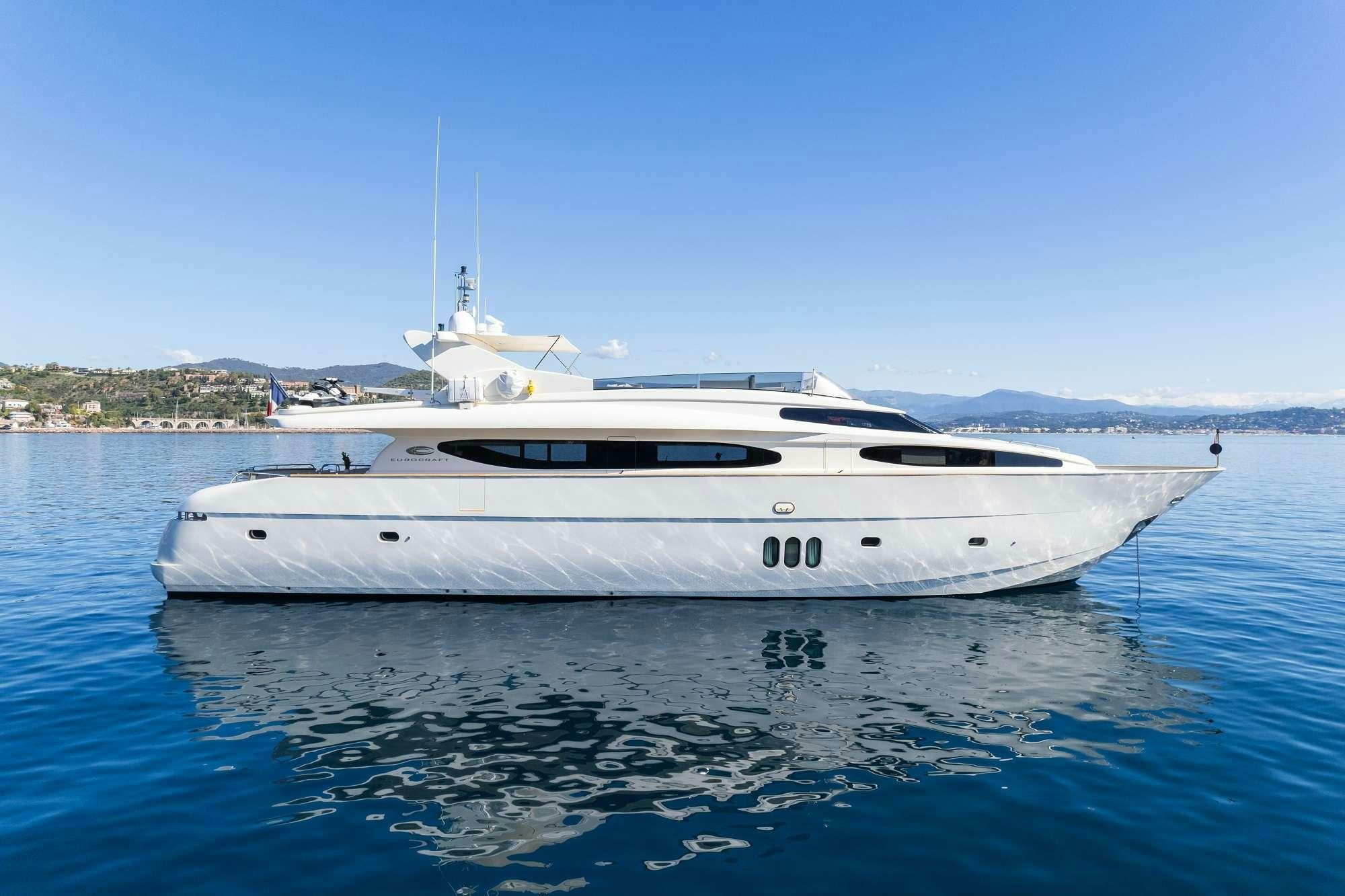 a white yacht in the water aboard BEIJA FLORE Yacht for Charter