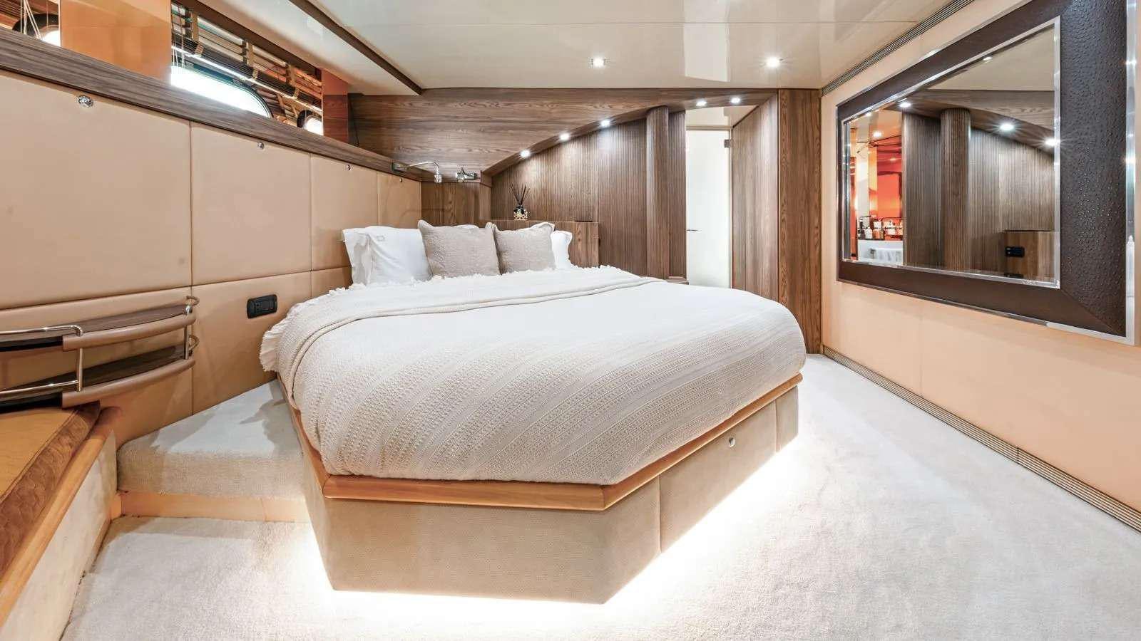 a bed in a room aboard PROMETHEUS I Yacht for Charter