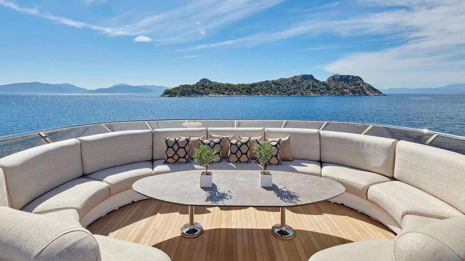 a table on a couch aboard PROMETHEUS I Yacht for Charter