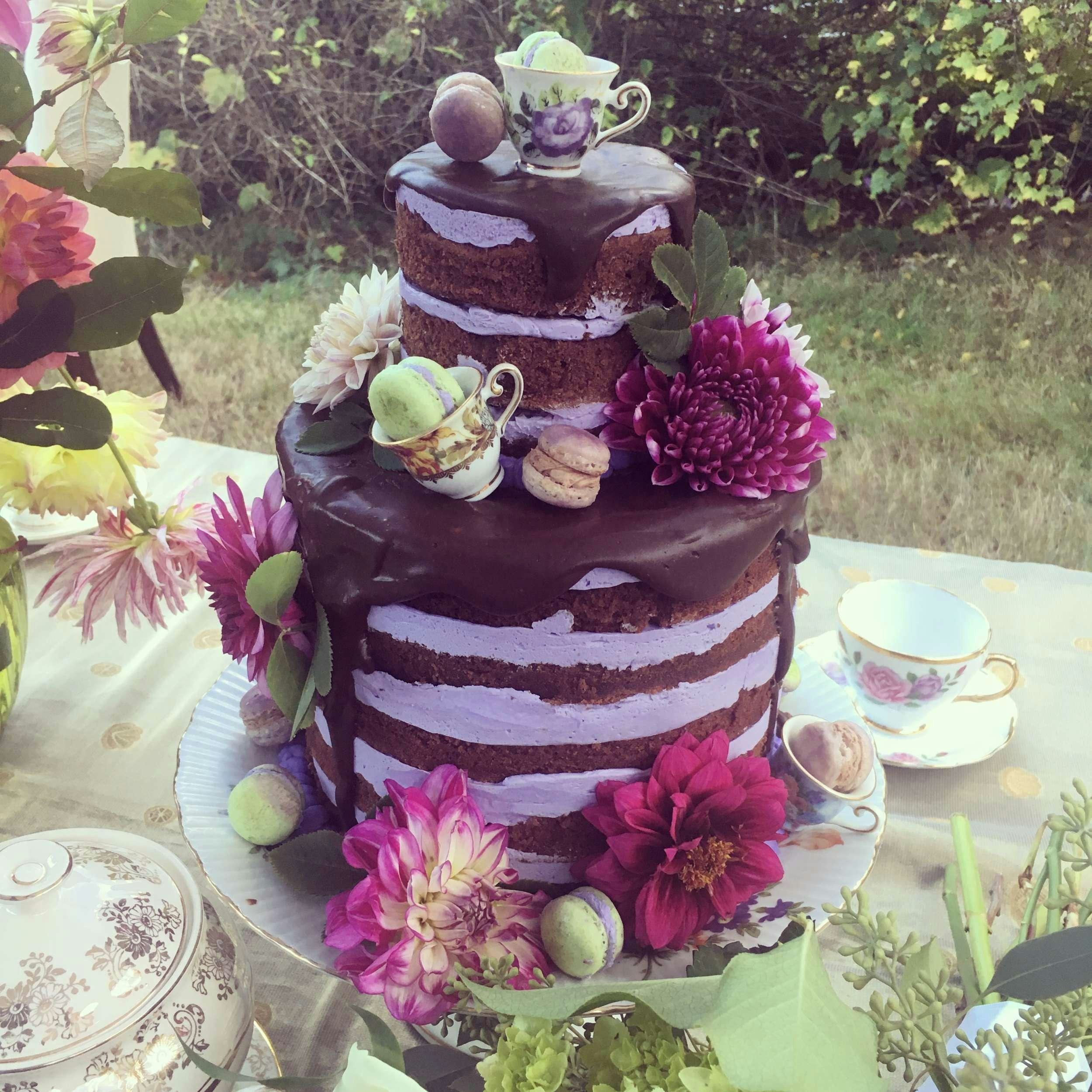 a cake with flowers and a crown aboard SUNREEF ECO 80 2024 Yacht for Charter