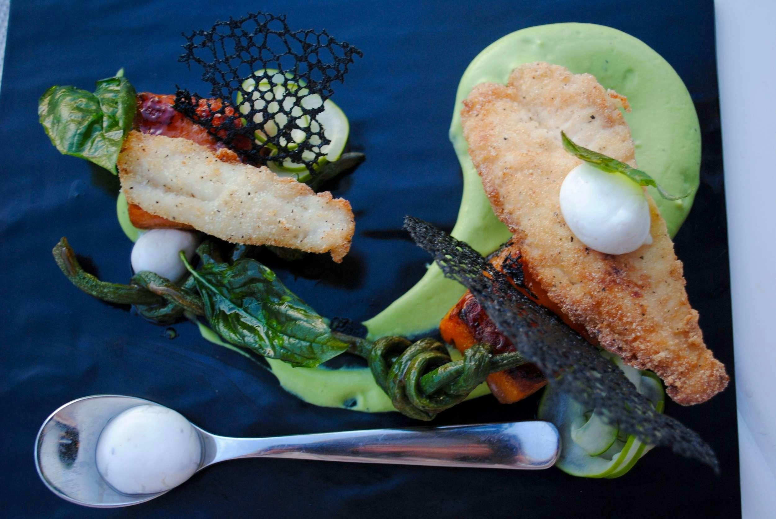 a plate of food aboard SUNREEF ECO 80 2024 Yacht for Charter