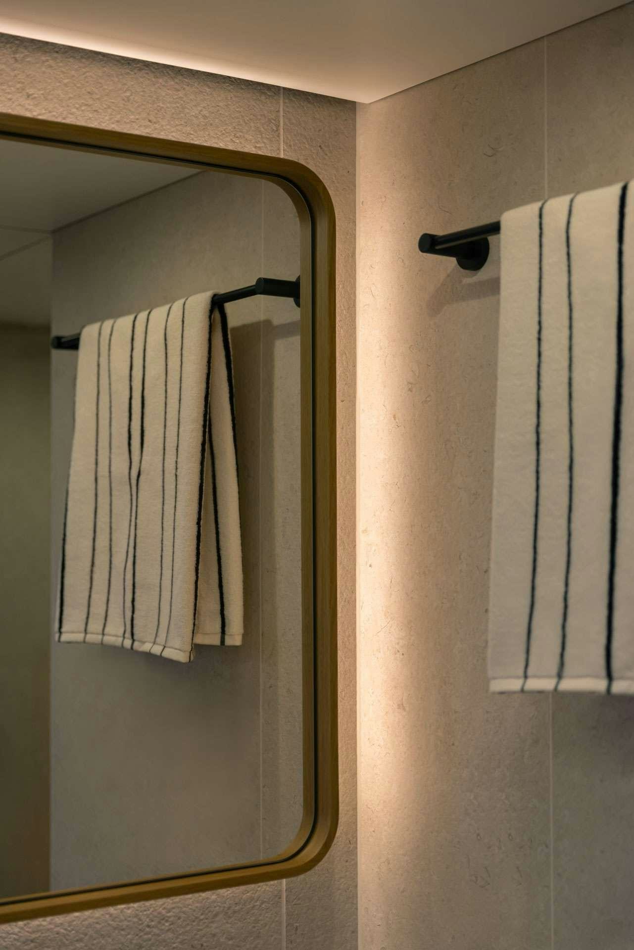 a towel on a rack aboard SUNREEF ECO 80 2024 Yacht for Charter