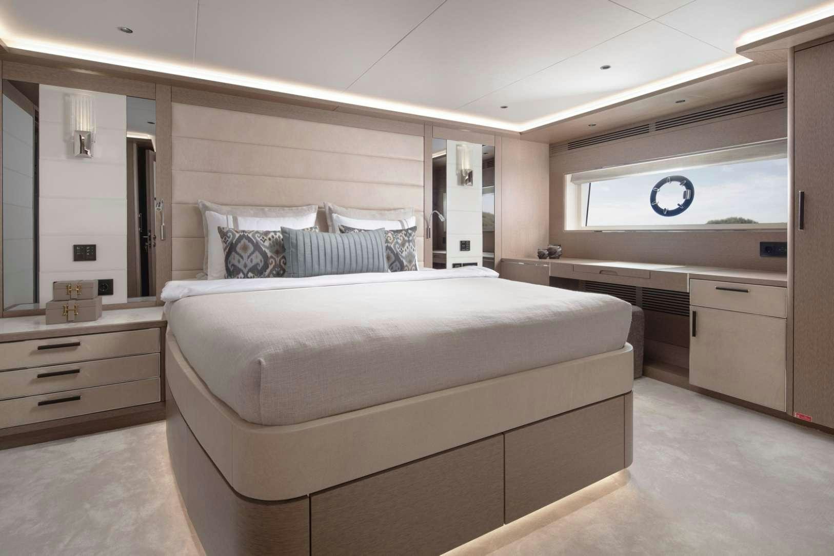 a bed in a room aboard MAJERA Yacht for Charter