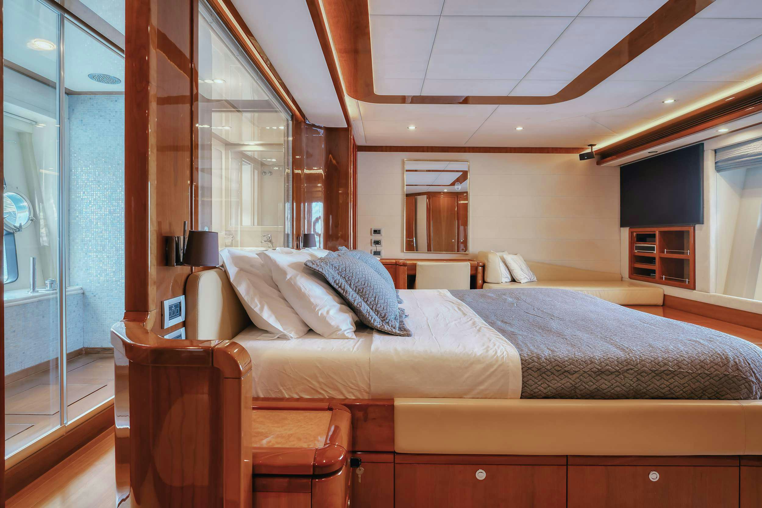 a bed in a room aboard LIDIA Yacht for Charter