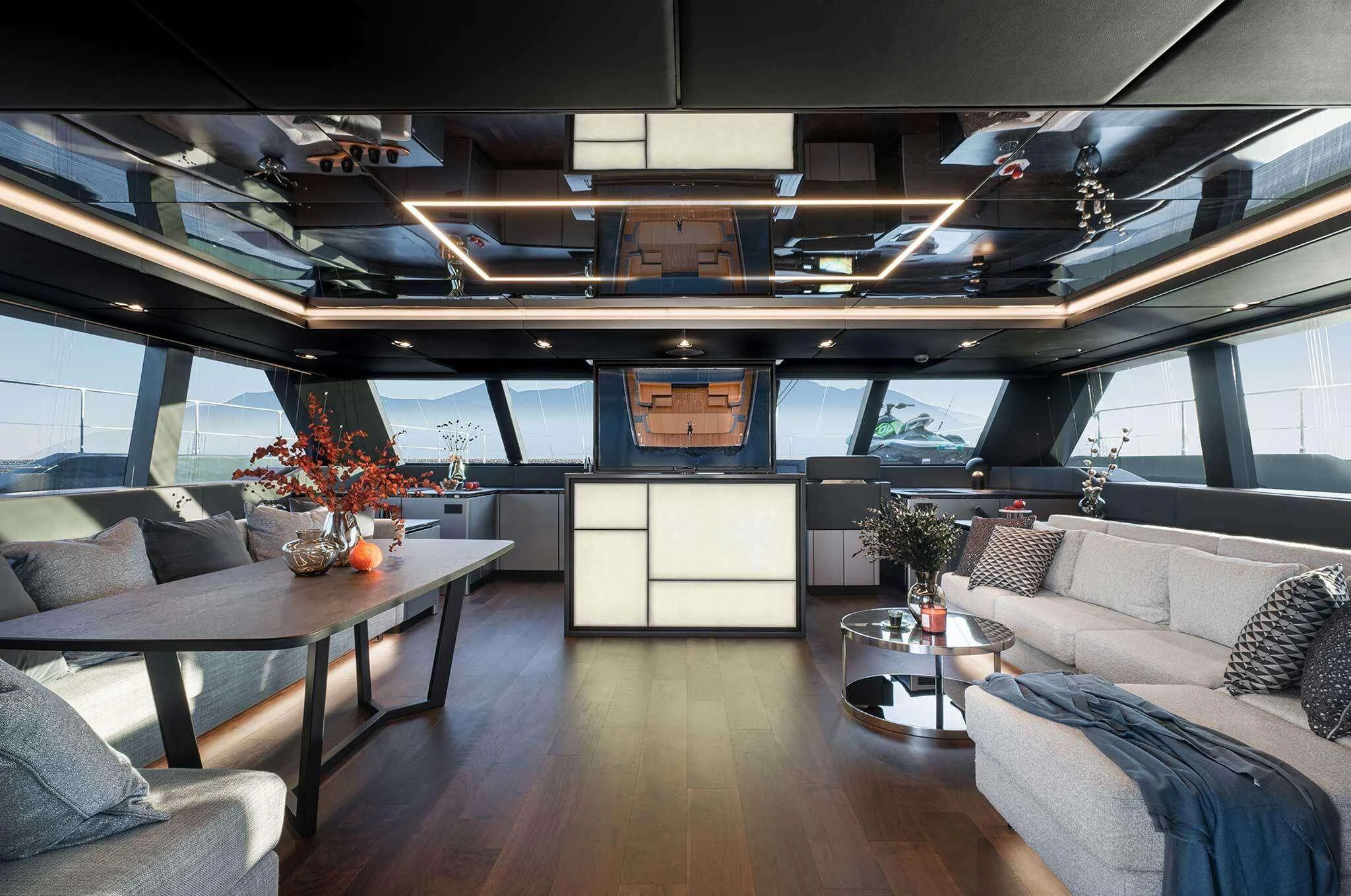 a living room with a wood floor aboard ALTEYA Yacht for Charter