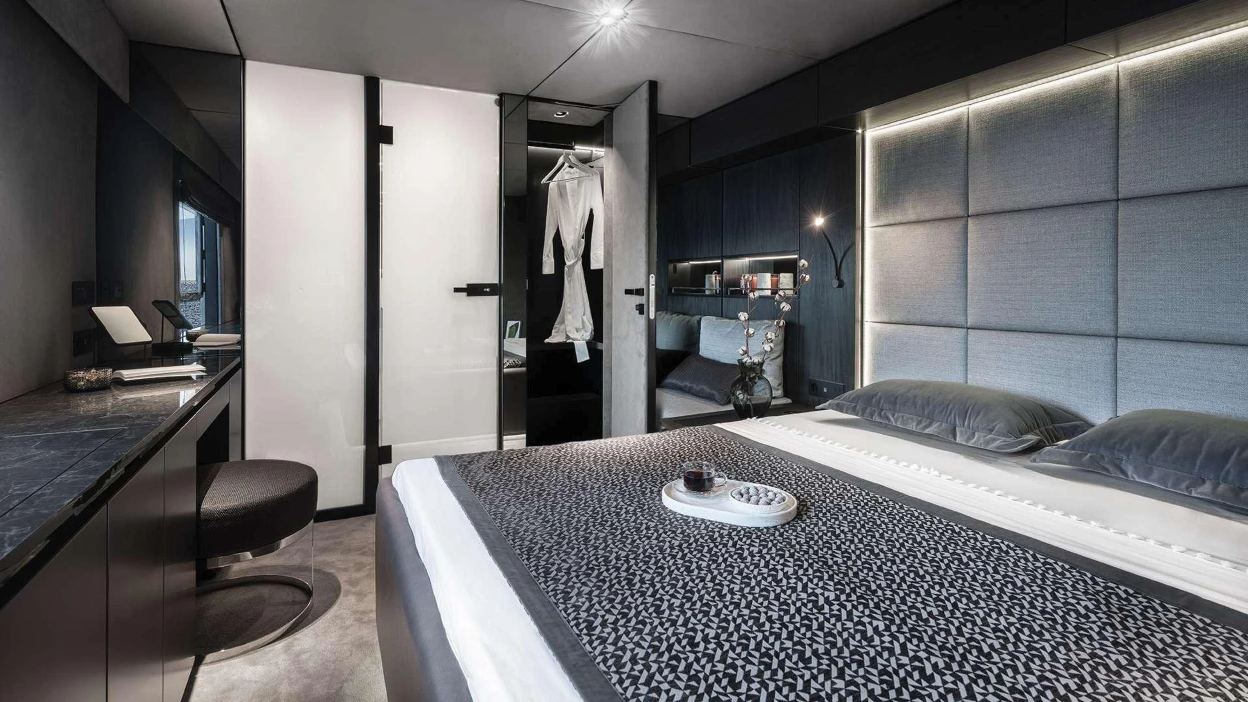 a large bedroom with a large bed aboard ALTEYA Yacht for Charter