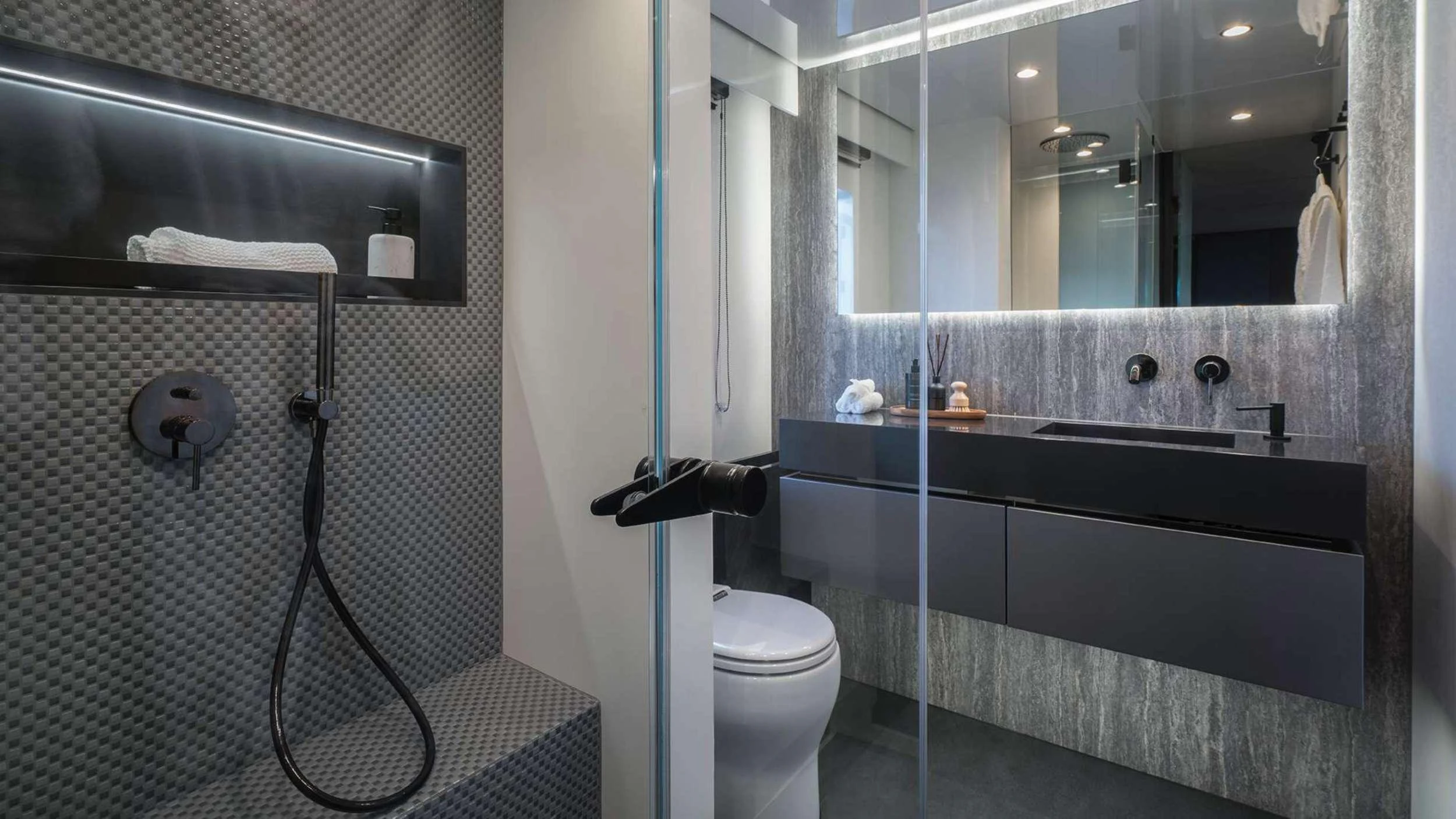 a bathroom with a sink and a toilet aboard ALTEYA Yacht for Charter