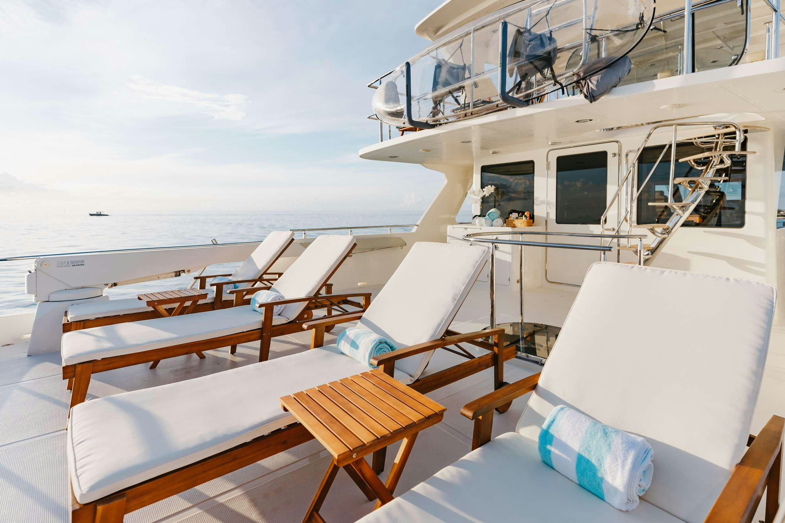 a boat with many seats aboard AURELIA Yacht for Charter