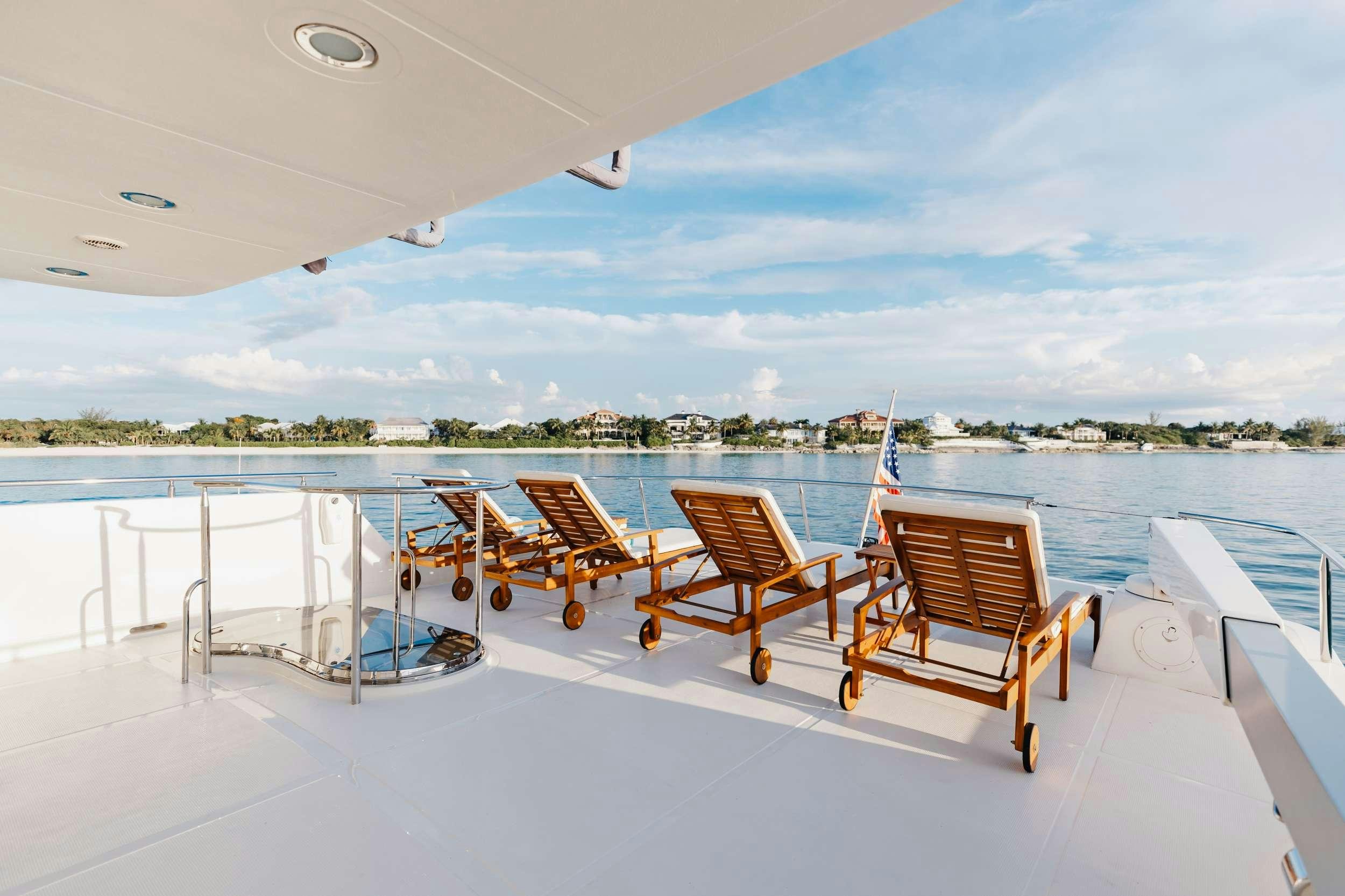 a group of chairs on a deck aboard AURELIA Yacht for Charter