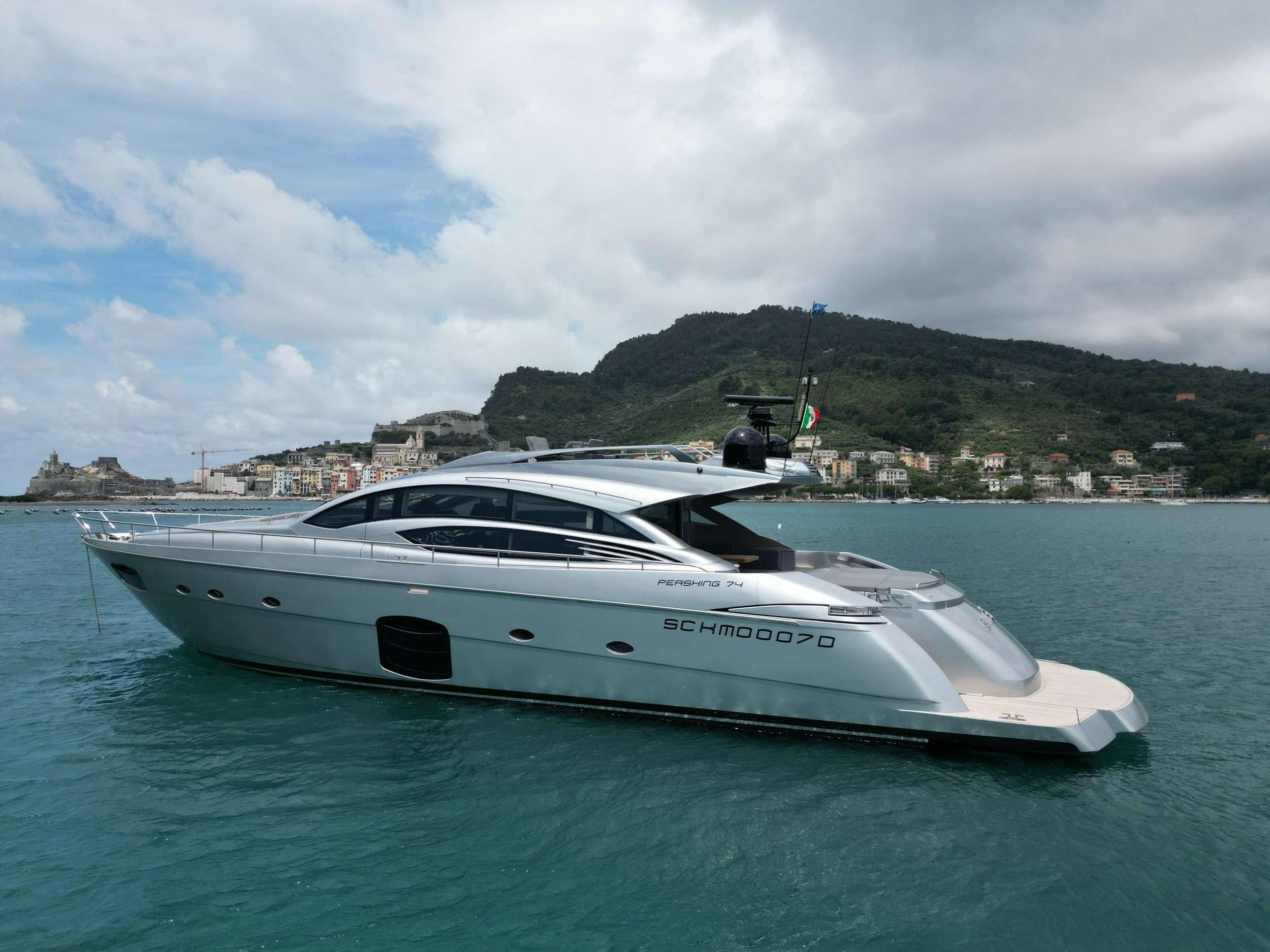 a white yacht in the water aboard SUE&NTILDE;O Yacht for Charter
