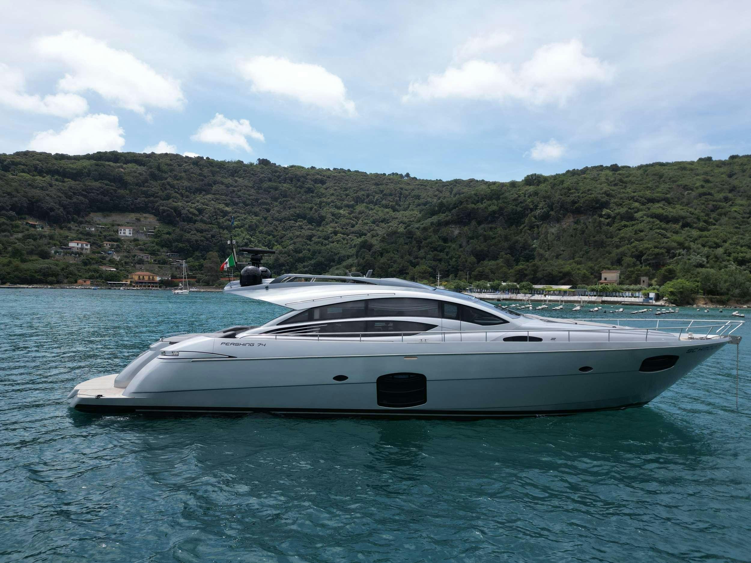 a white yacht in the water aboard SUE&NTILDE;O Yacht for Charter