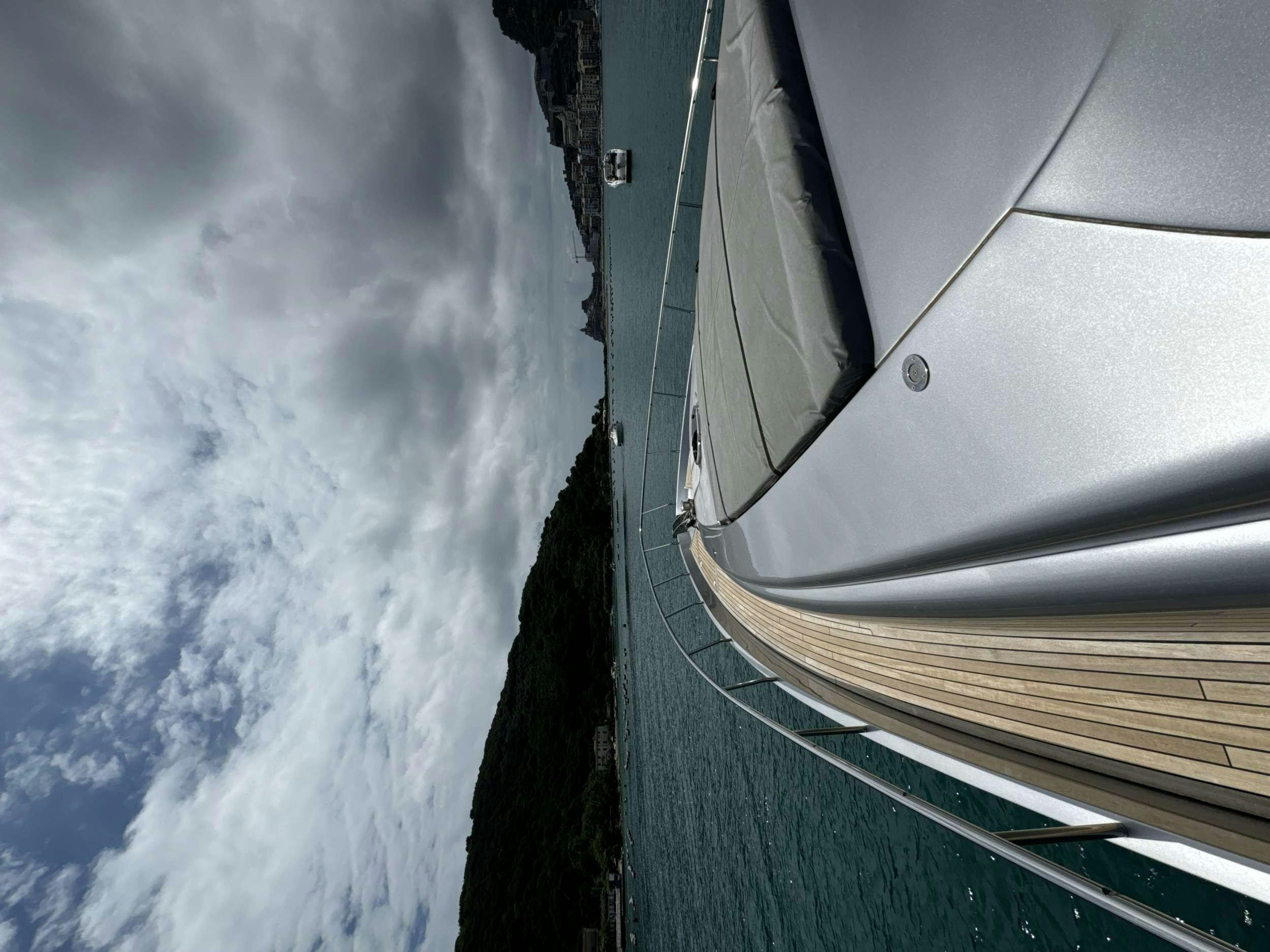a view of a car on a road with clouds aboard SUE&NTILDE;O Yacht for Charter